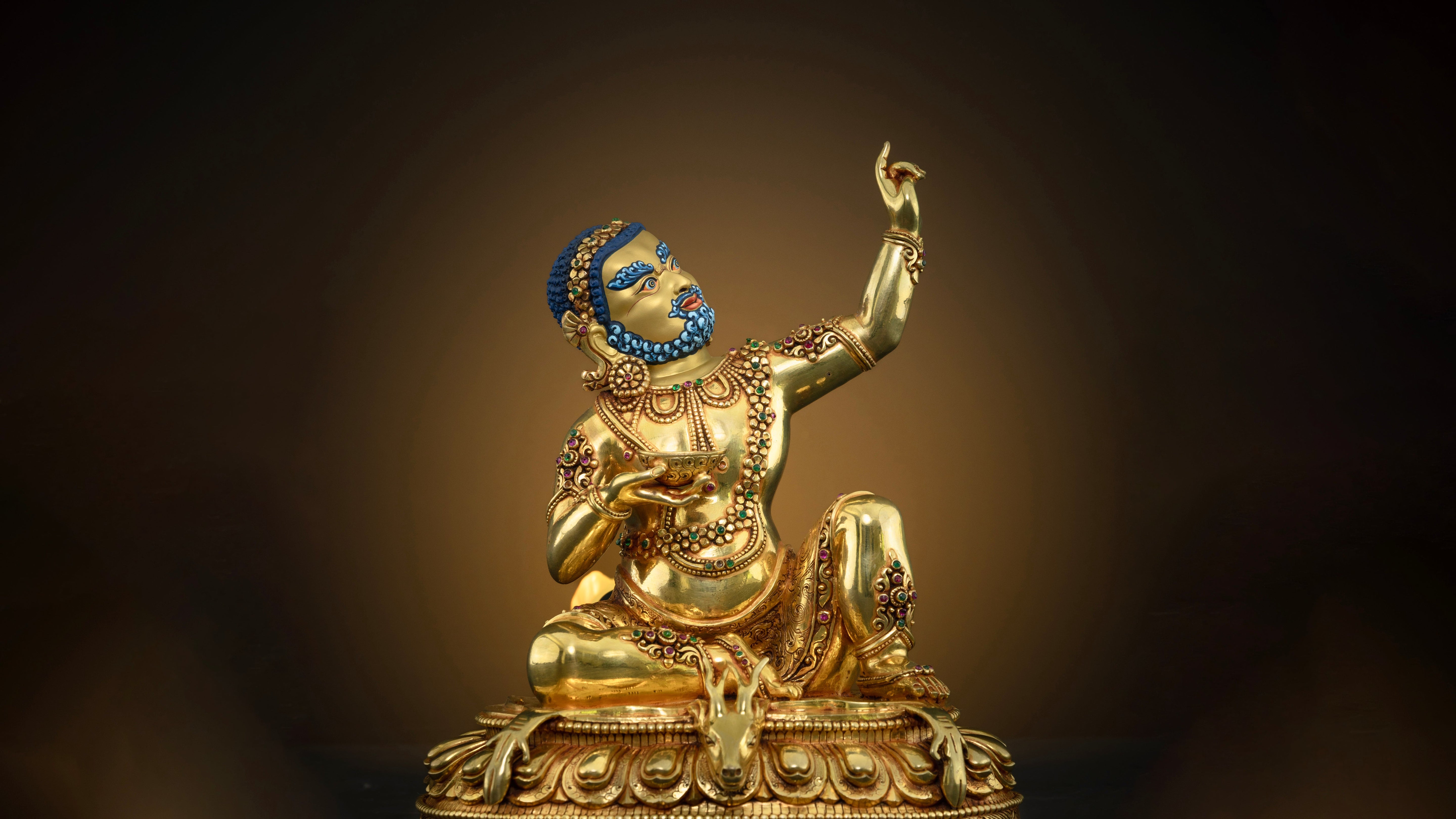 Gold plated virupa statue with intricate hand carved designs