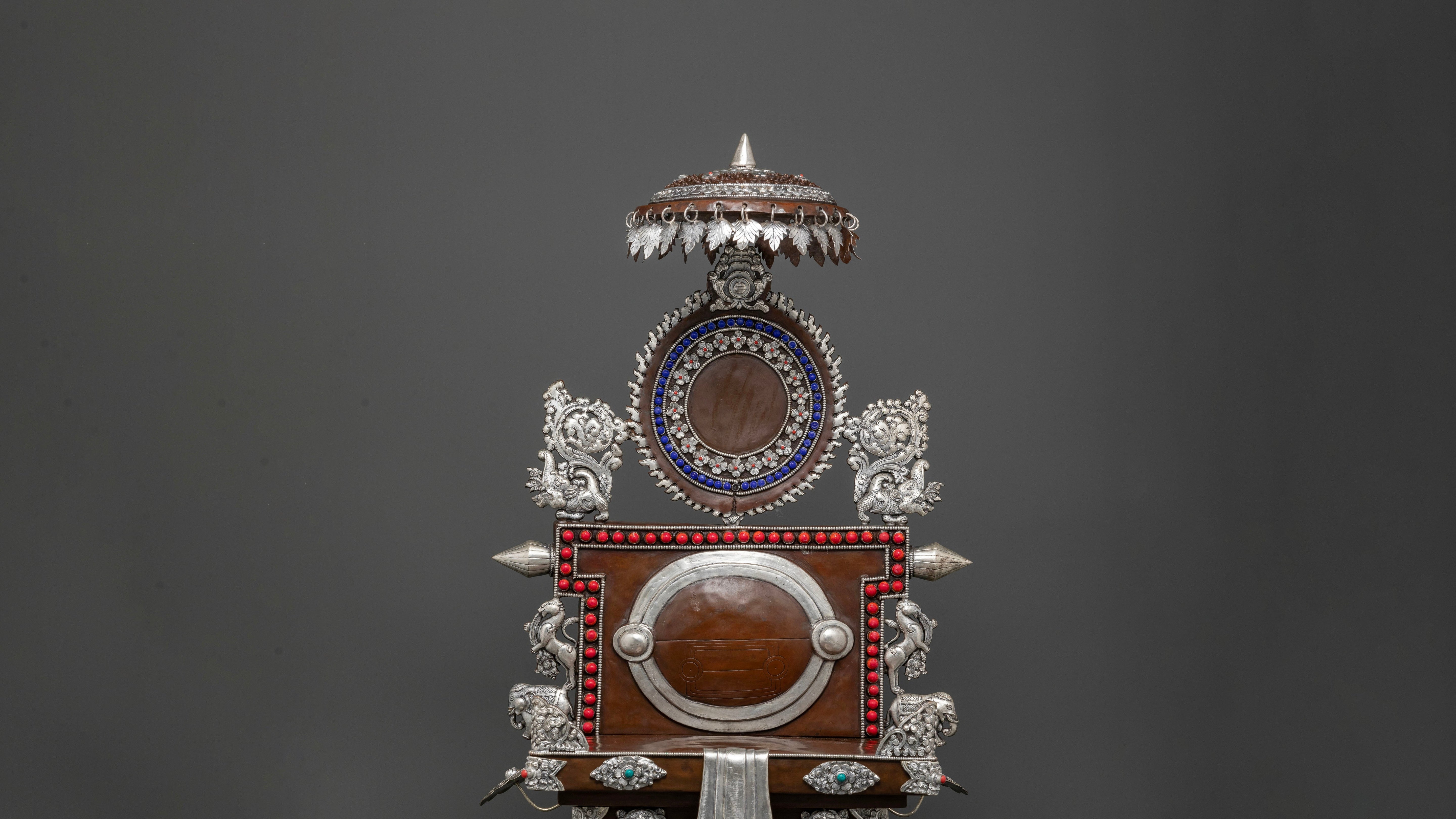 a copper made throne for deities to sit on