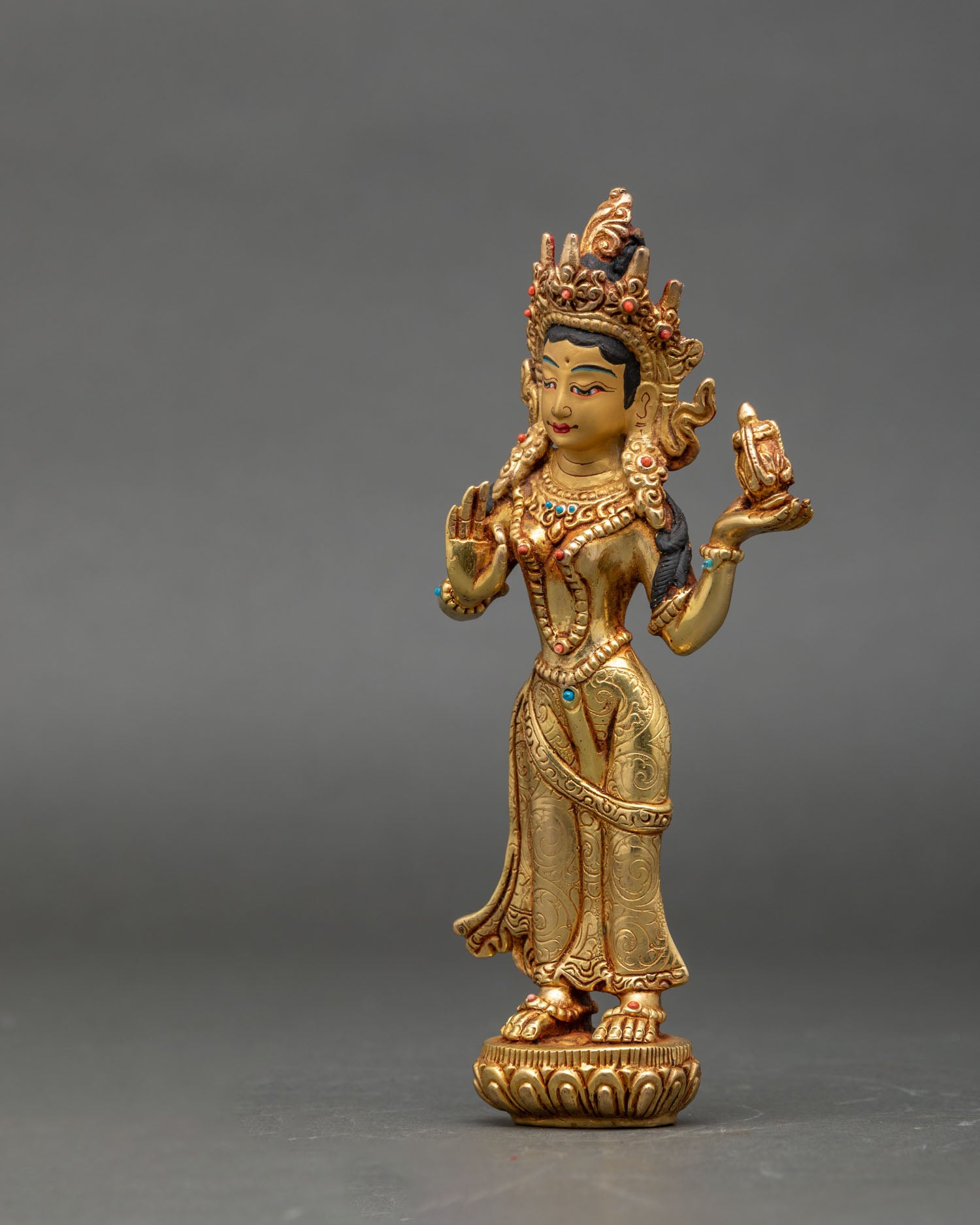 regular-close-up-mandarava-statue-intricate-floral-robe-details