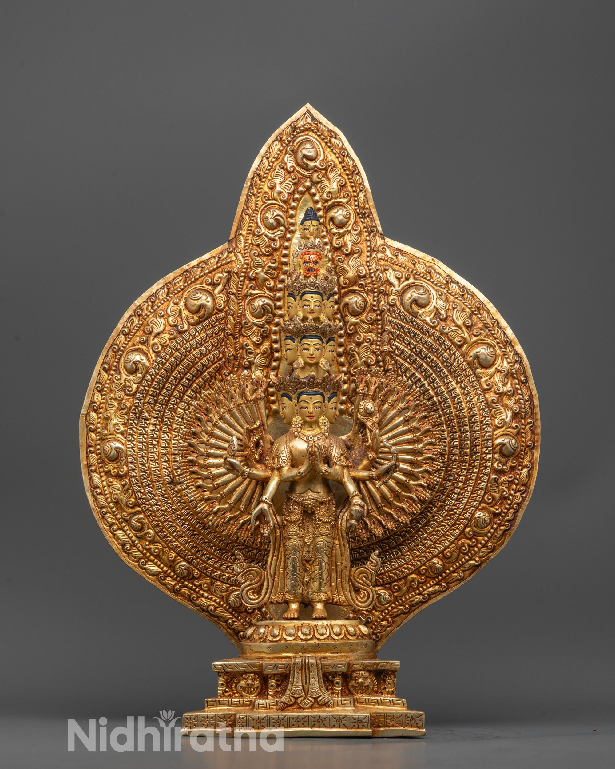 1000-Armed Chenrezig statue with gold-gilded face and gold fire-gilded body