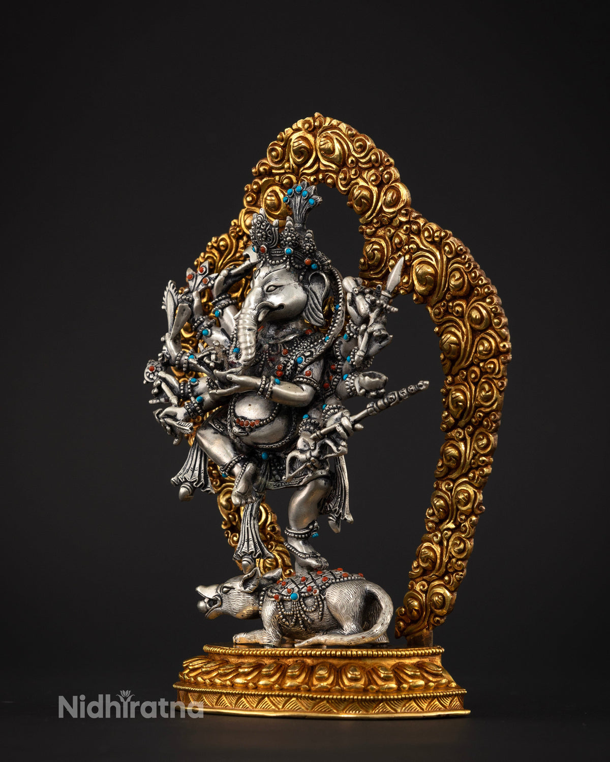 12 armed Ganesh statue with gold gilded copper lotus pedestal and hand carved floral halo