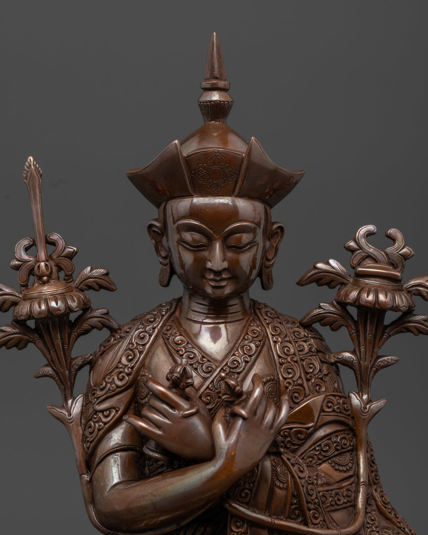 Statue of 16th karmappa wearing black crown also known as the Vajra Mukut which symbolizes compassions and the interconnectedness of all beings | Oxidized copper 16th Karmapa statue | Buddhist leader 16th Karmapa statue