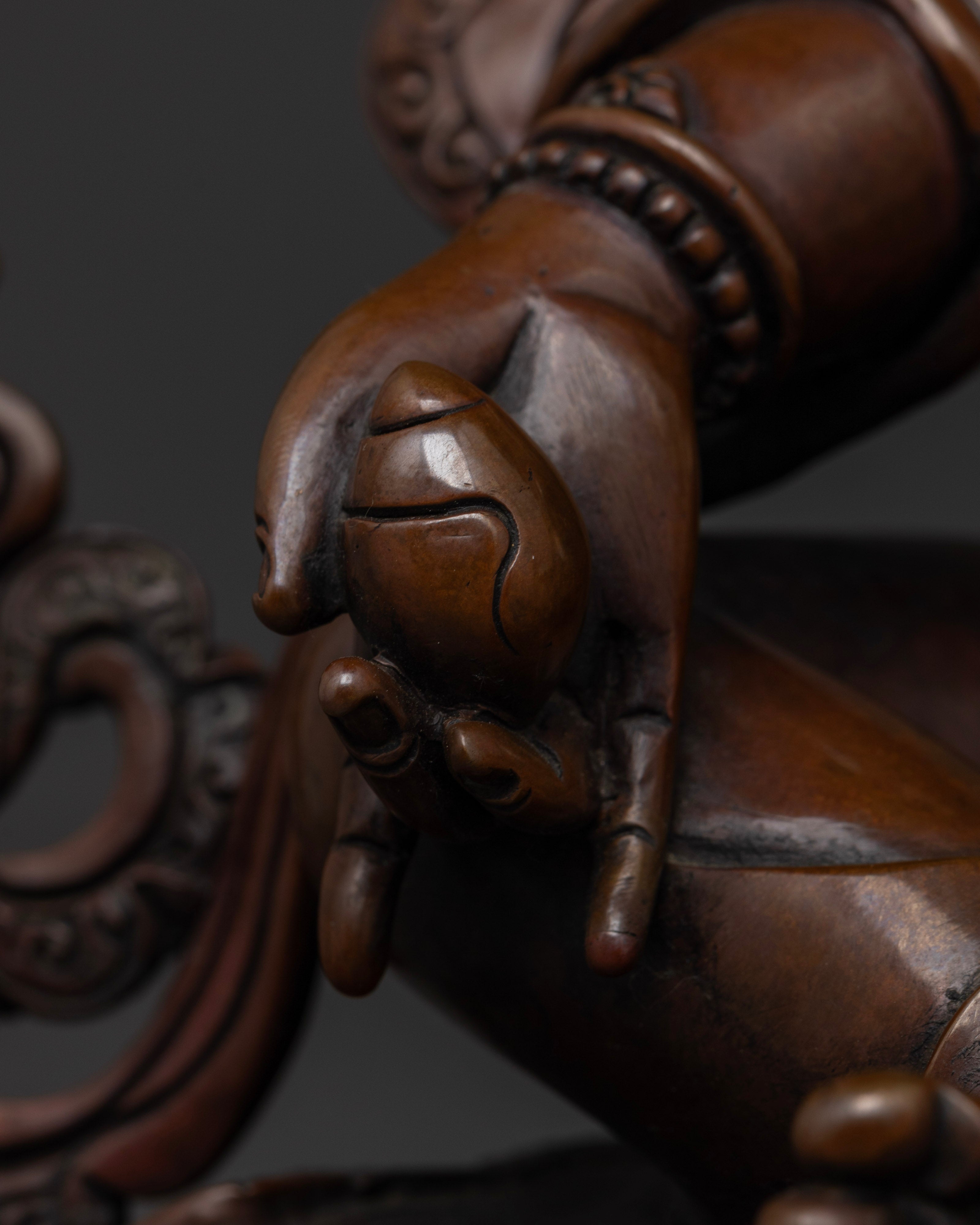 Hand-Carved Dzambhala Statue in Oxidized Copper