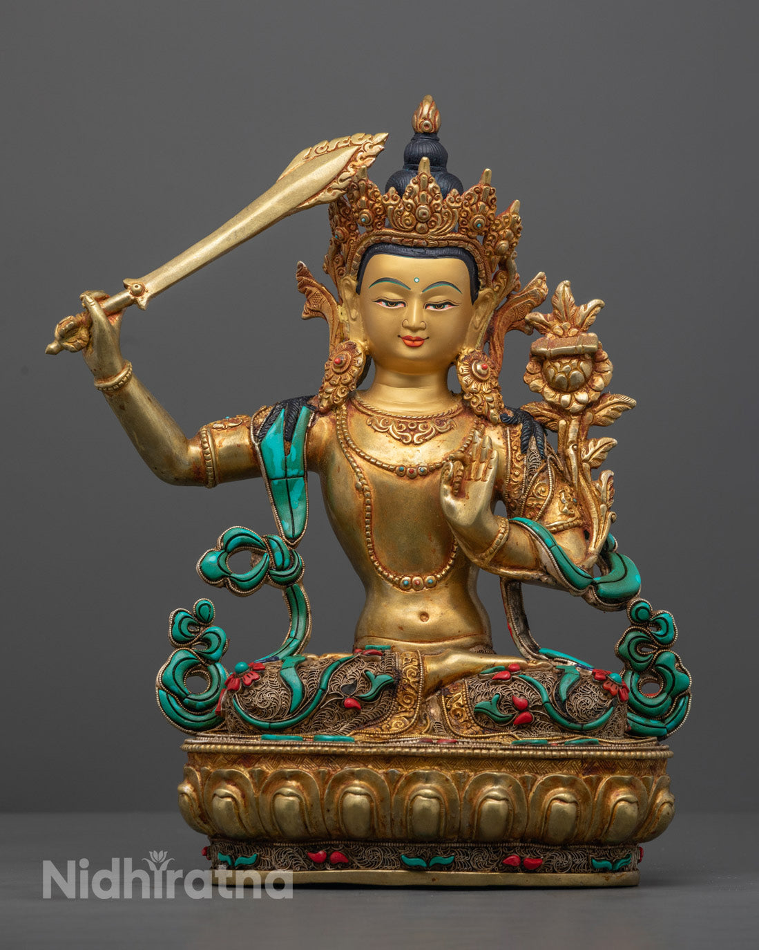 24K gold-gilded Manjushri sculpture seated on a lotus throne, showcasing intricate Nepalese craftsmanship and serene facial expression symbolizing enlightened wisdom