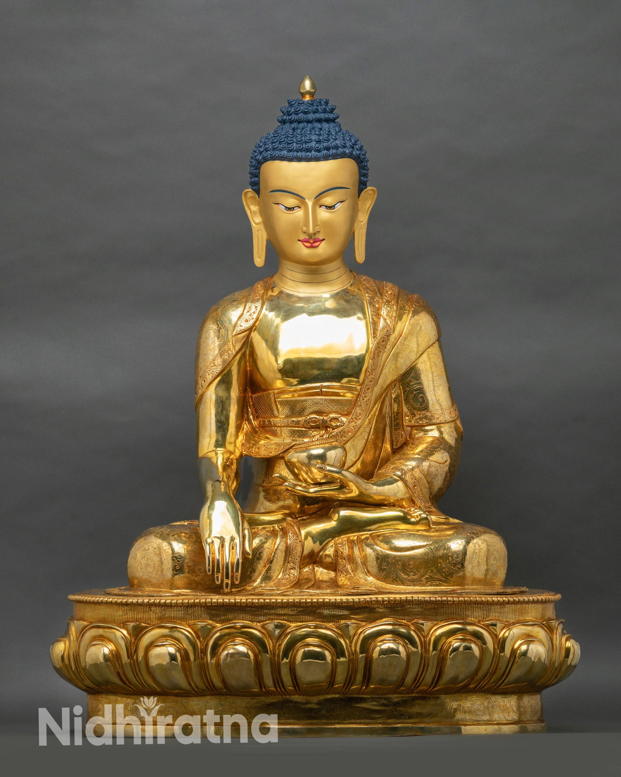 38-inch Shakyamuni Buddha statue in gold fire-gilded copper, seated in bhumisparsha mudra on lotus throne