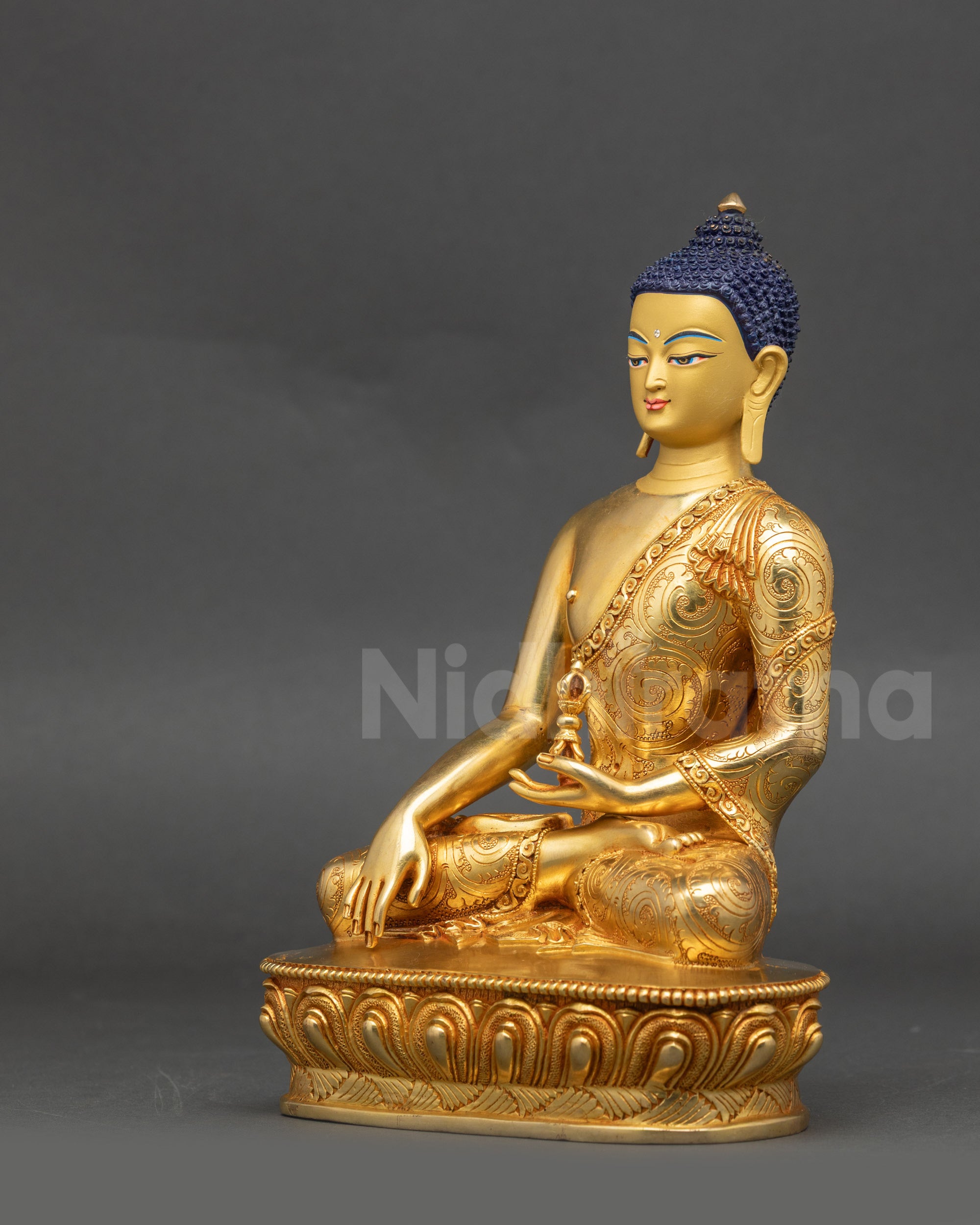 Akshobhya Buddha left side view detailed gold-gilded statue