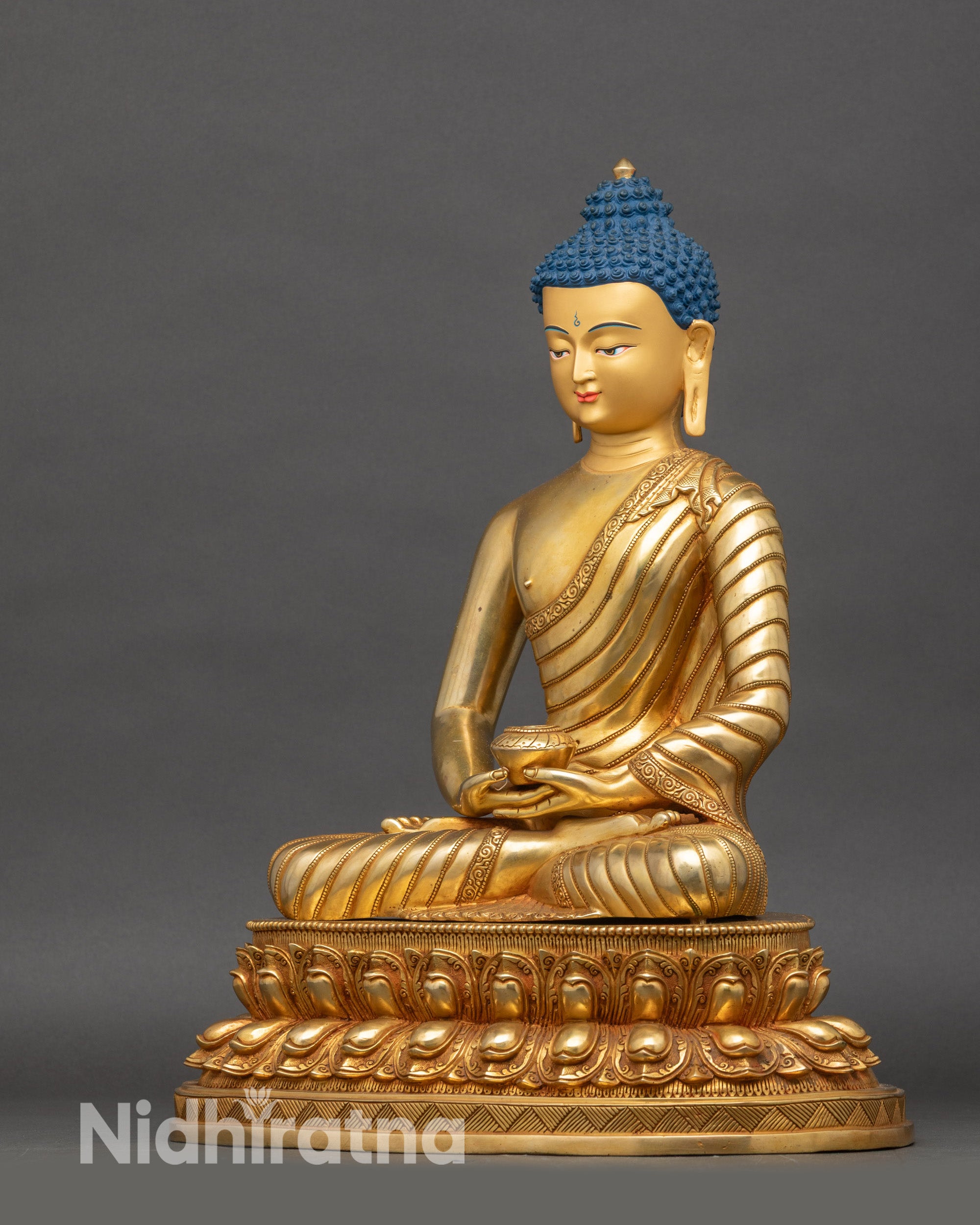 Left-side view of Amitabha Buddha statue, seated on double-layered lotus, gold detailing
