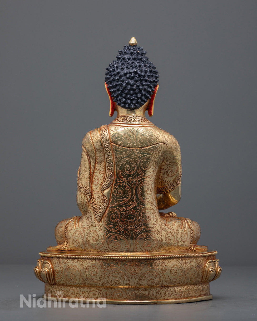 Amitabha Buddha Statue seated in meditation pose, adorned with 24k fire gilded gold and vibrant acrylic colors