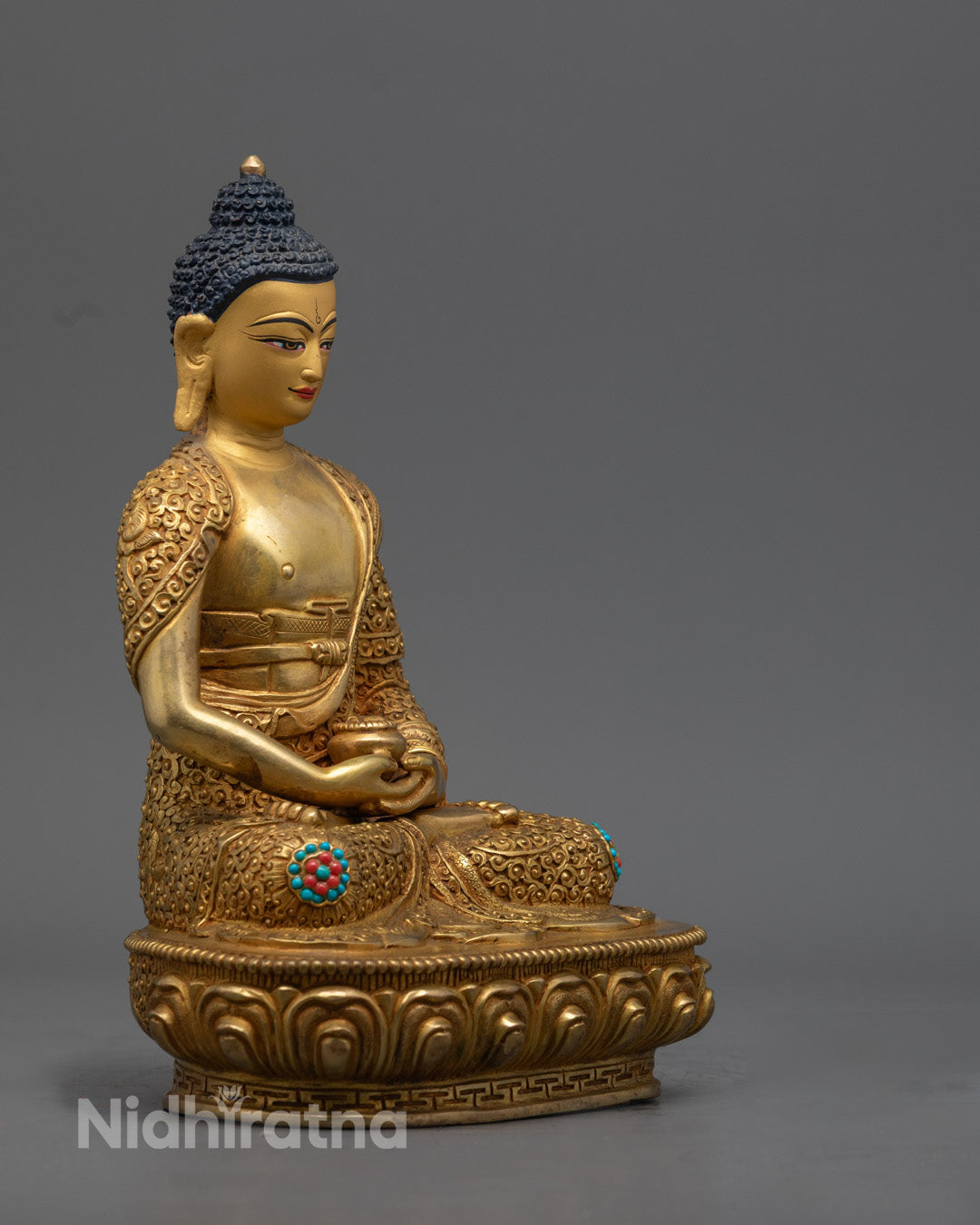 Amitabha Buddha statue featuring hollow chamber for auspicious mantra insertion, highlighting intricate hand-carved details.