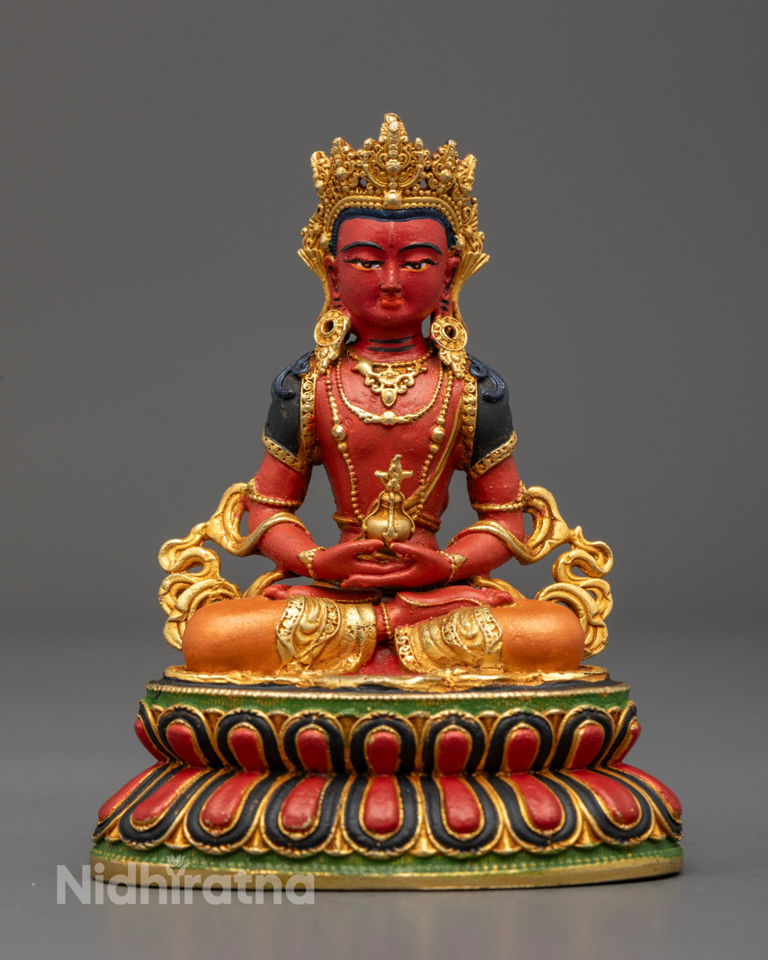 Front view of Amitayus Statue in copper with multicolor acrylic finish, holding amrita vase symbolizing longevity and immortality.