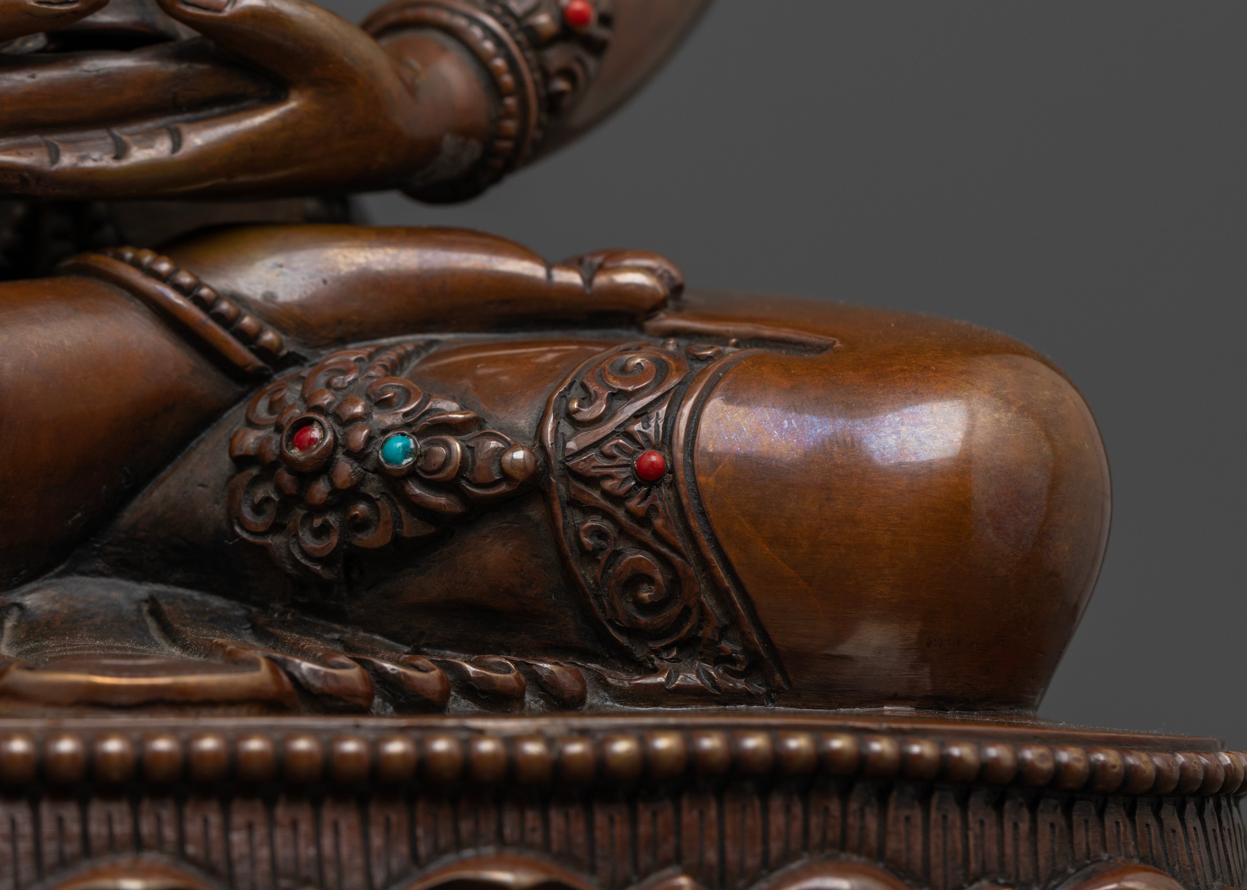 crossed leg of brown Amitayus Buddha statue