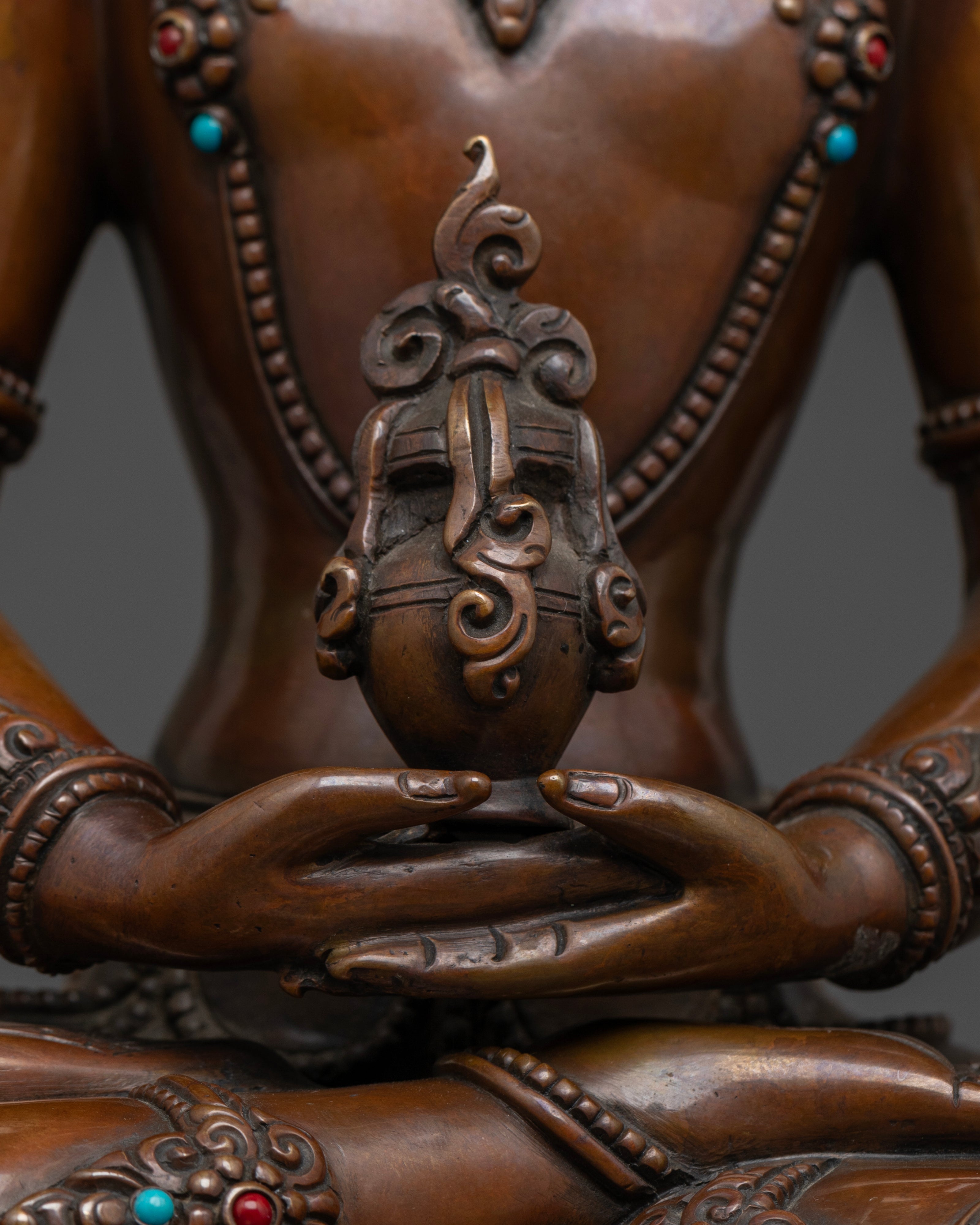 Amitayus Buddha statue holding the nectar of life