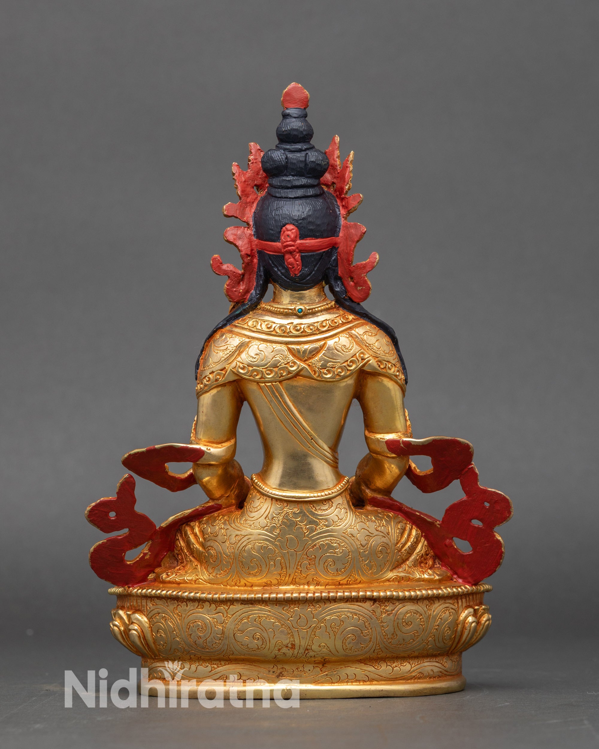 Amitayus Buddha seated on lotus throne holding sacred long-life vase, copper sculpture