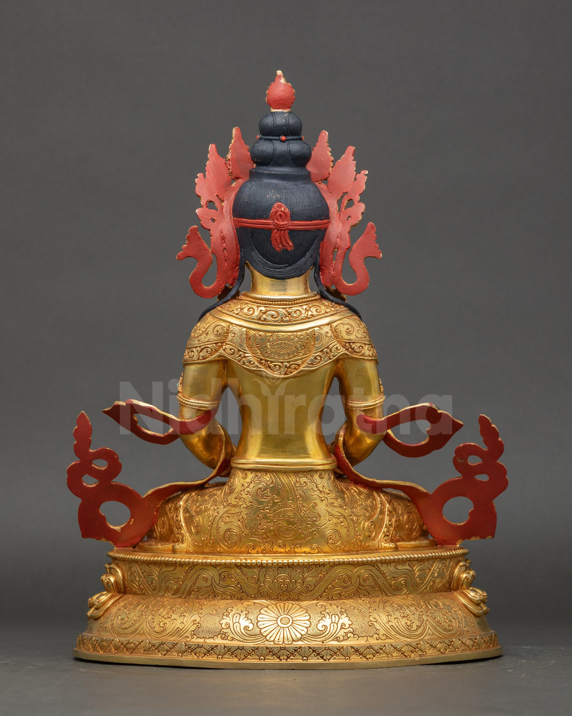 Rear view of handcrafted Amitayus statue showing detailed lotus pedestal