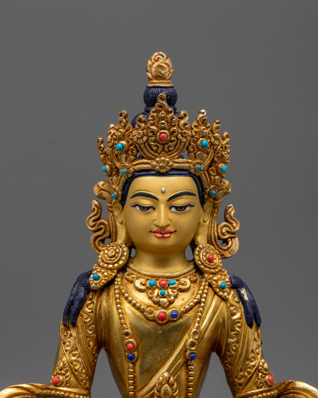 Amitayus statue adorned with semi-precious stones and vibrant acrylic colors, handcrafted in Nepal