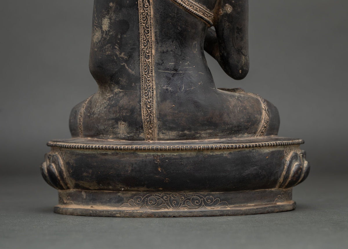 Antique-Finish Amoghasiddhi Buddha Statue | Traditional Buddhist Art