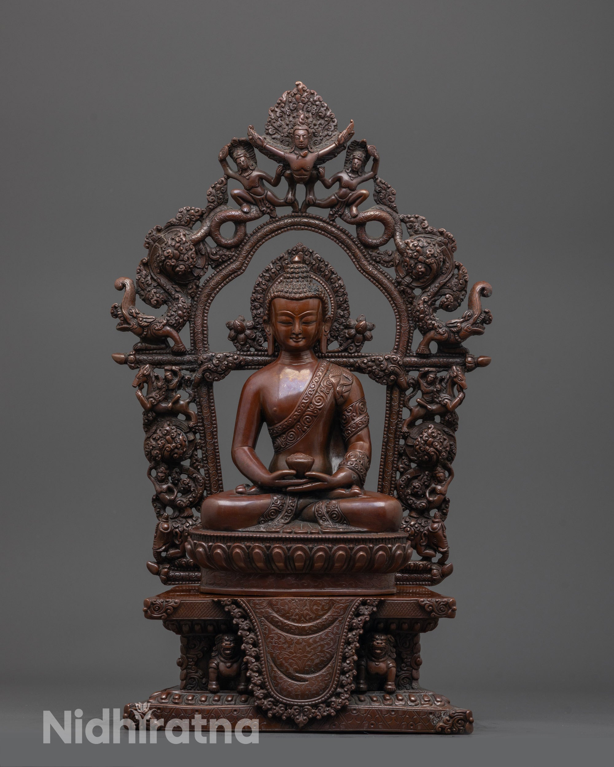 Front view of hand-carved Amitabha Buddha Statue in oxidized copper