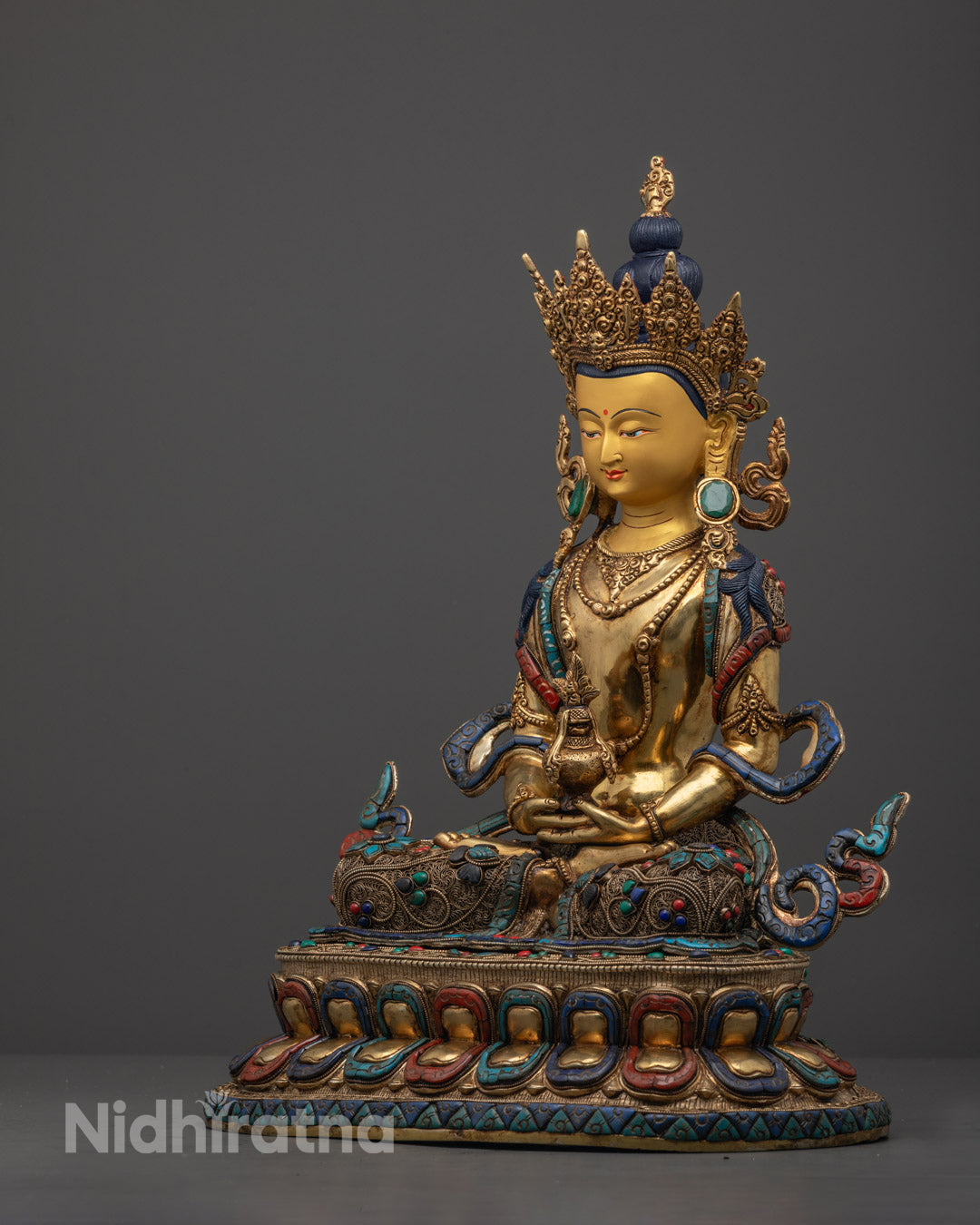 Artisan-made Amitayus Buddha Statue representing longevity, compassion, and inner peace with vibrant acrylic colors and intricate jewelry carving.