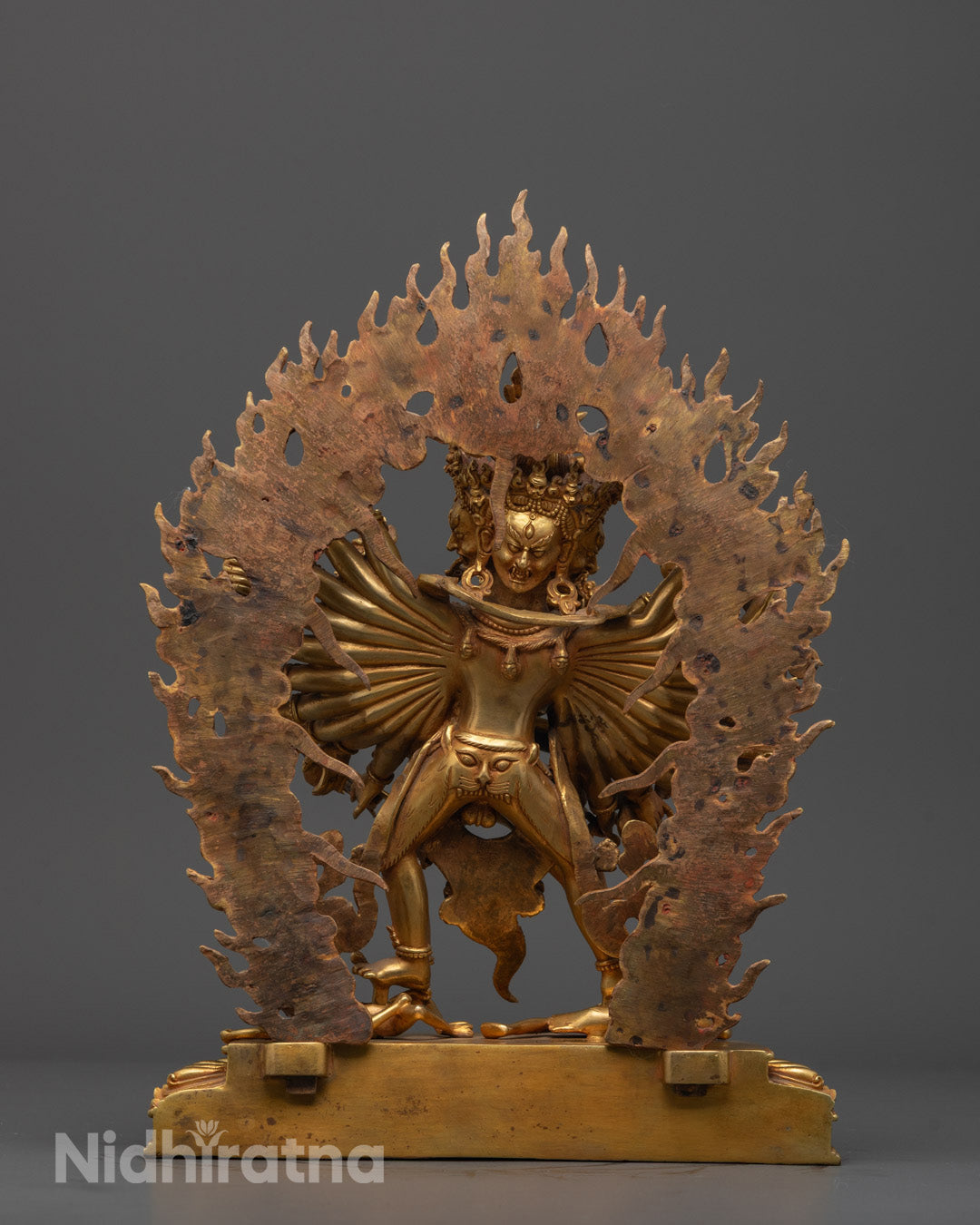 Artisan-made Kalachakra statue with radiant fire-gilded gold finish and lotus base