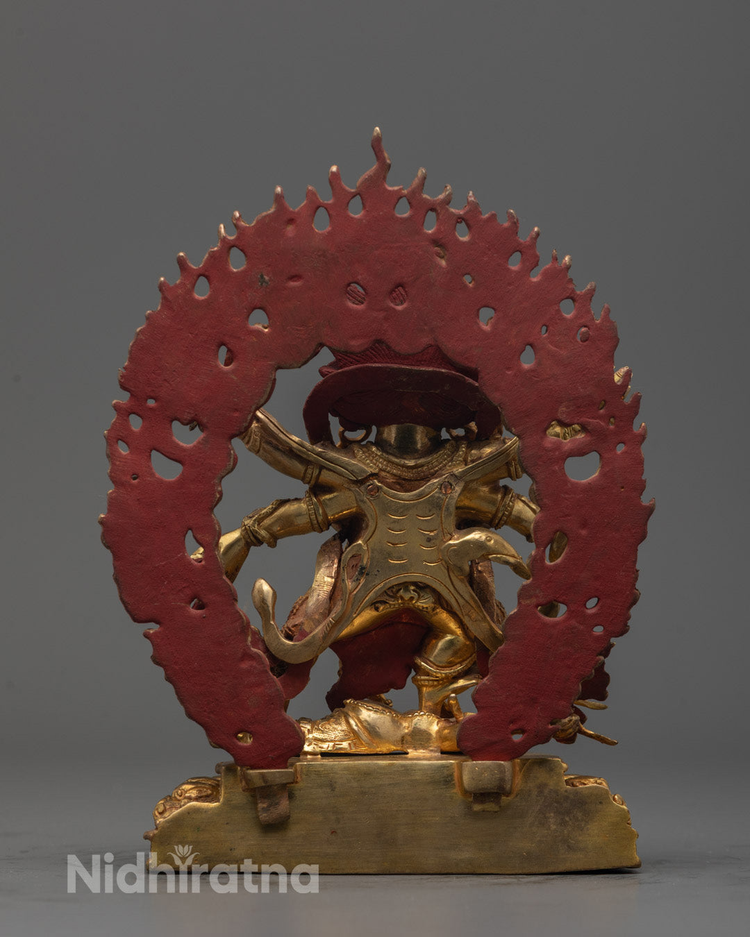 Artisan handcrafting the Six Armed Mahakala Statue using the lost wax method in Patan