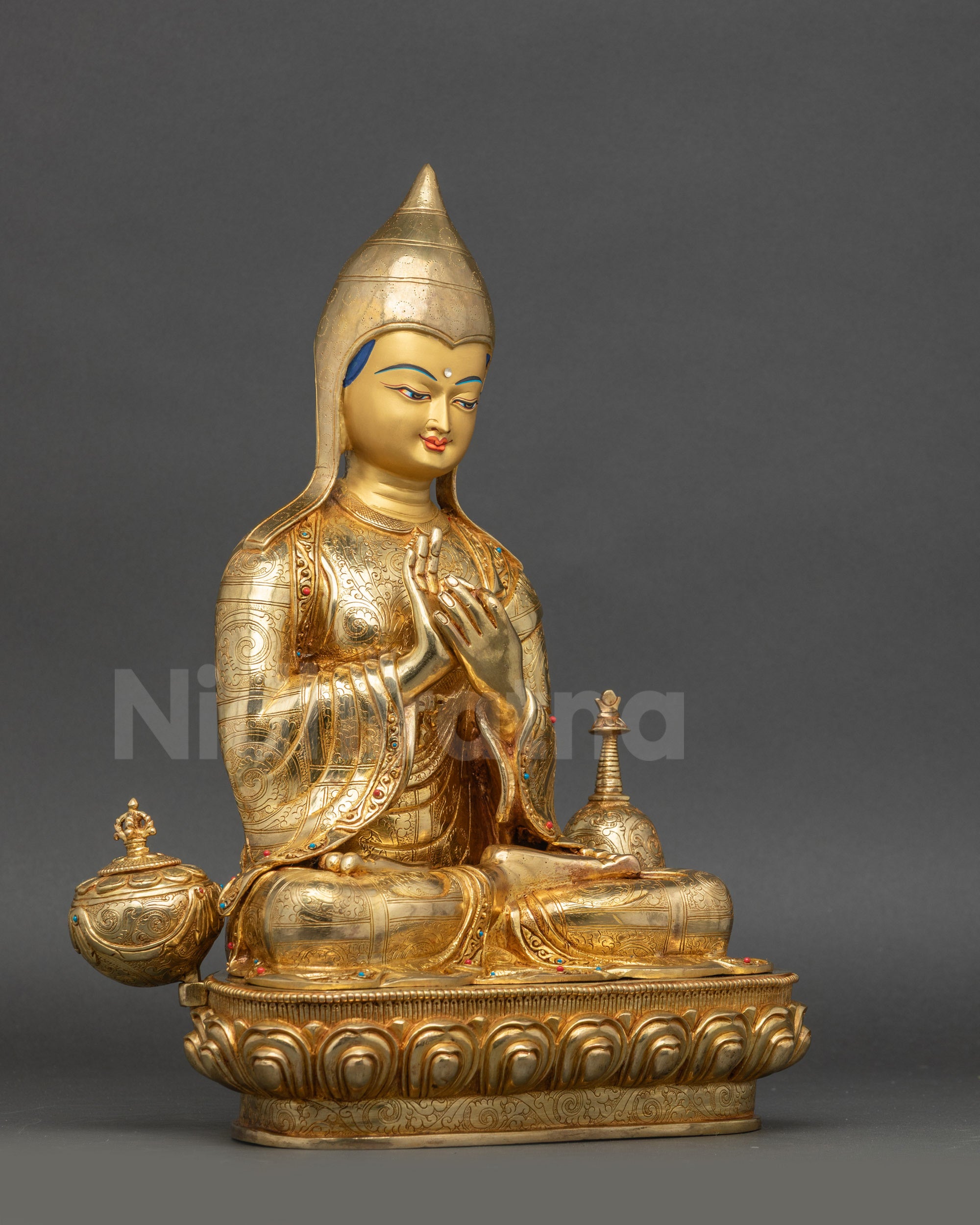 Atisha Monk Sculpture right side view showing lotus seat and sacred vase