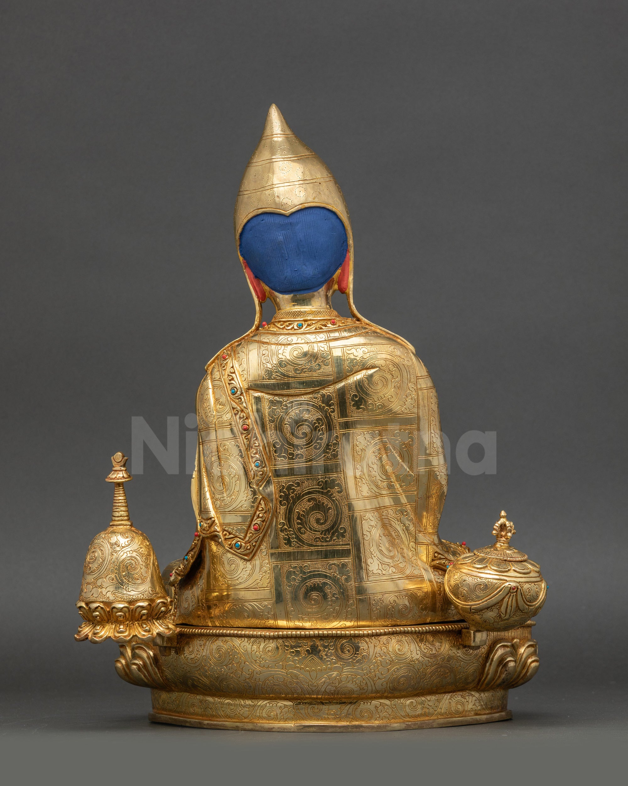 Atisha Statue back view showing carved robes and detailed Himalayan craftsmanship