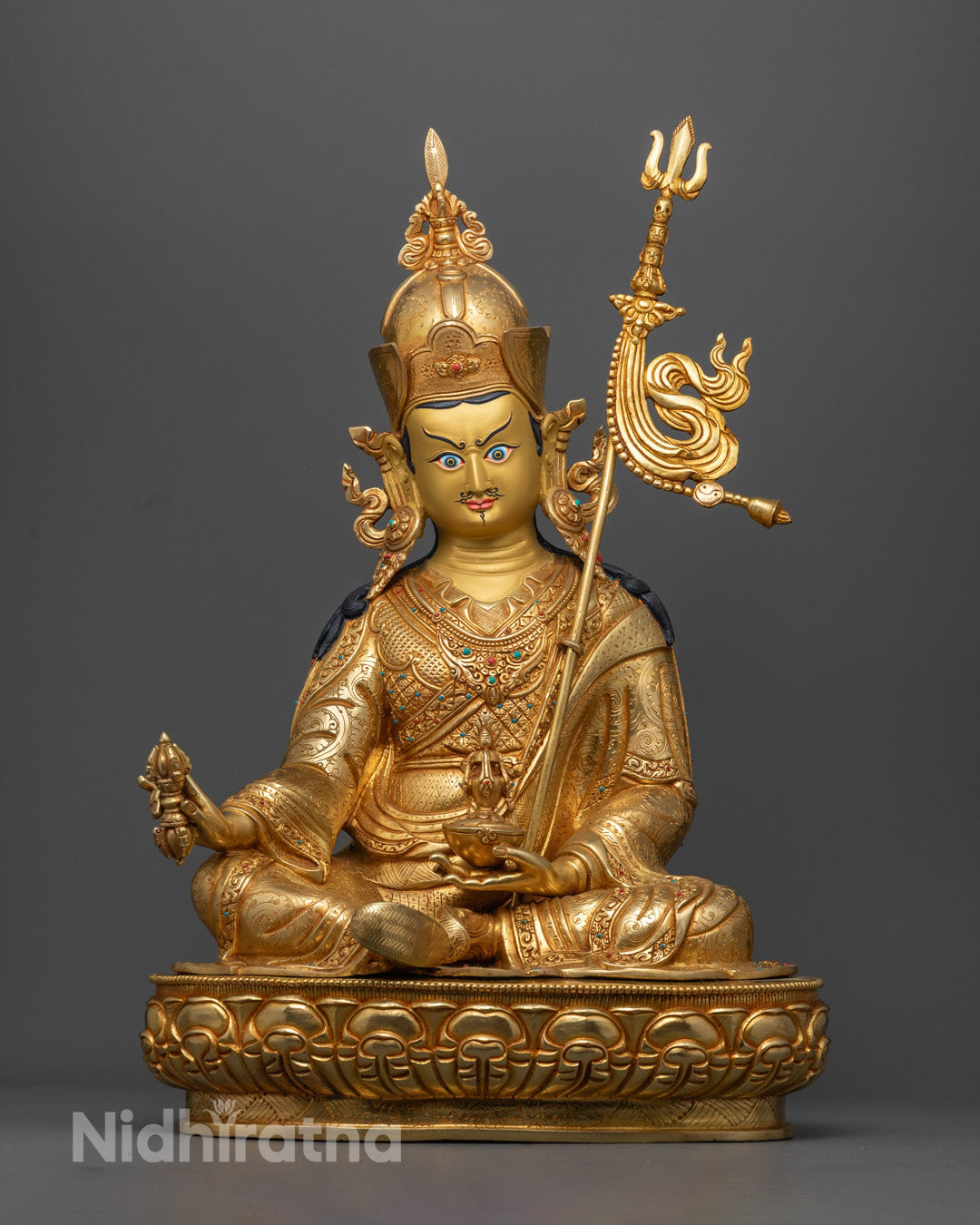 Authentic Guru Rinpoche Statue showing intricate carvings and detailed chuba garment handcrafted using lost wax method.