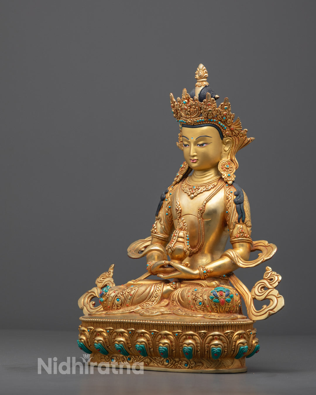 Authentic Himalayan Amitayus Buddha statue featuring detailed craftsmanship and radiant acrylic colors