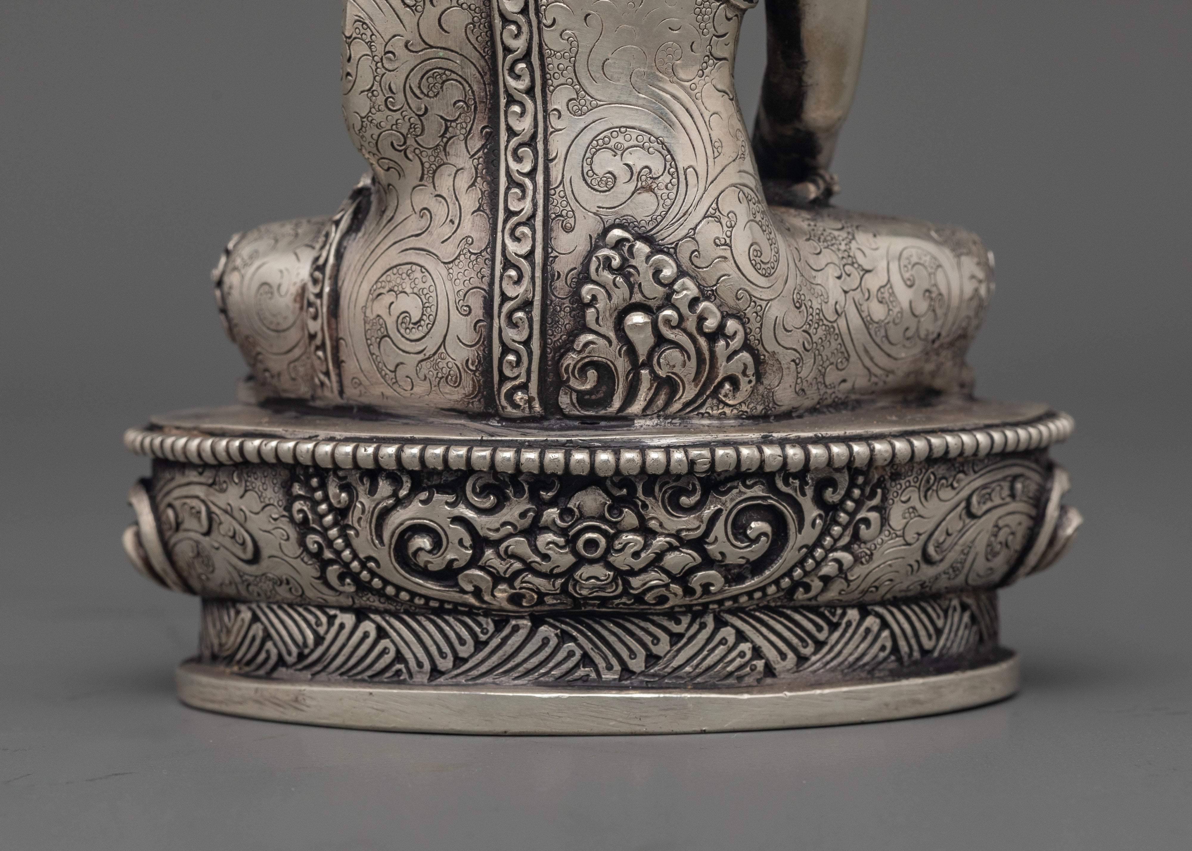 Silver Illumination: The Tranquil Aura of Shakyamuni Buddha