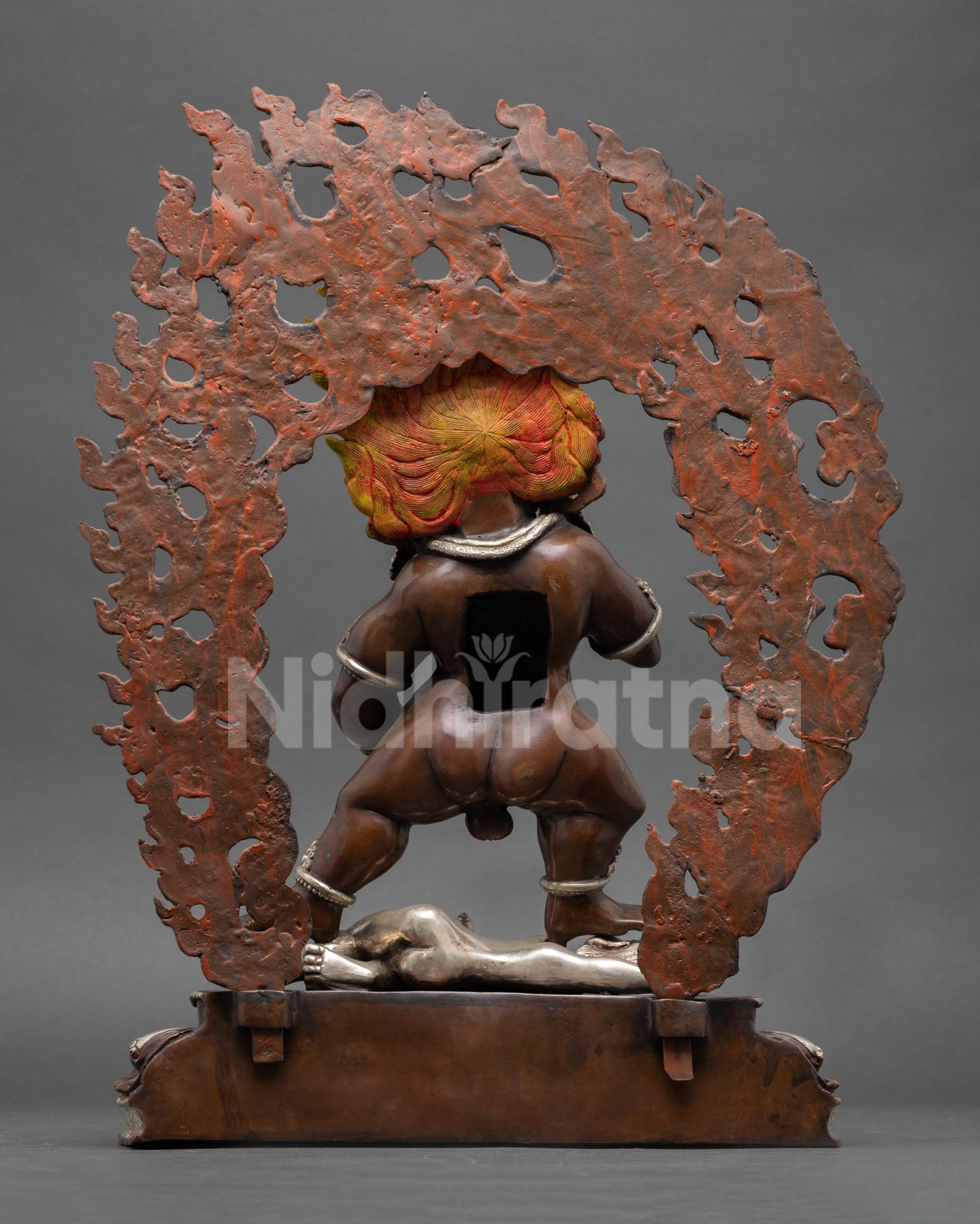 Back view Black Dzambhala copper statue carved halo oxidized finish Tibetan wealth deity art