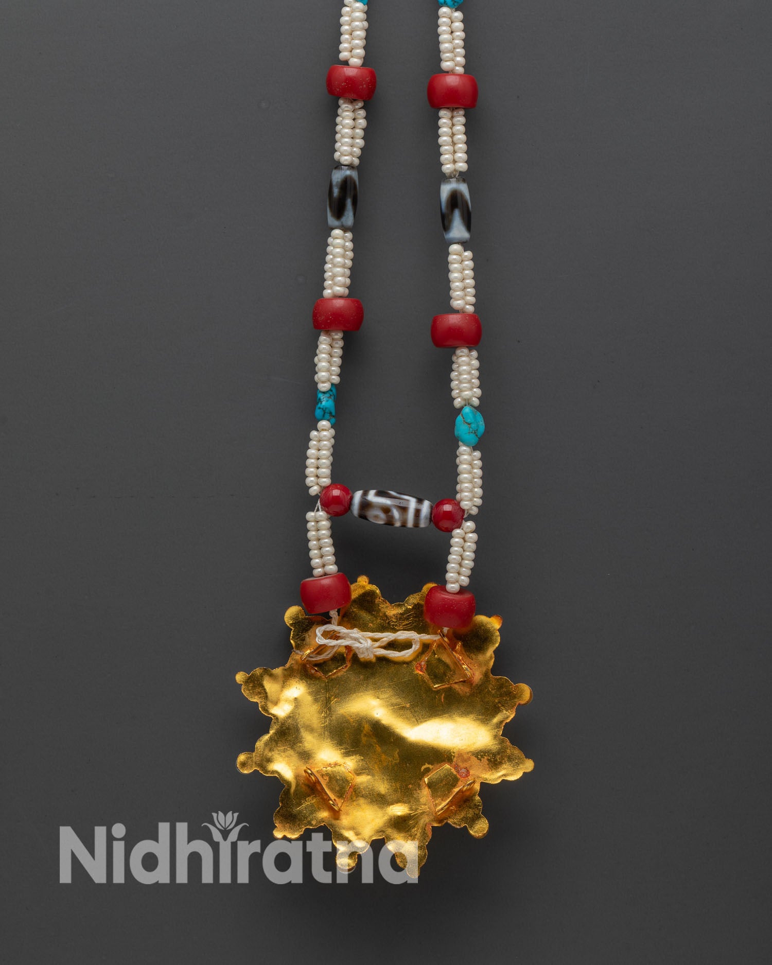 Back view Ghau Mala gold-plated beads intricate Himalayan craftsmanship spiritual home altar décor
