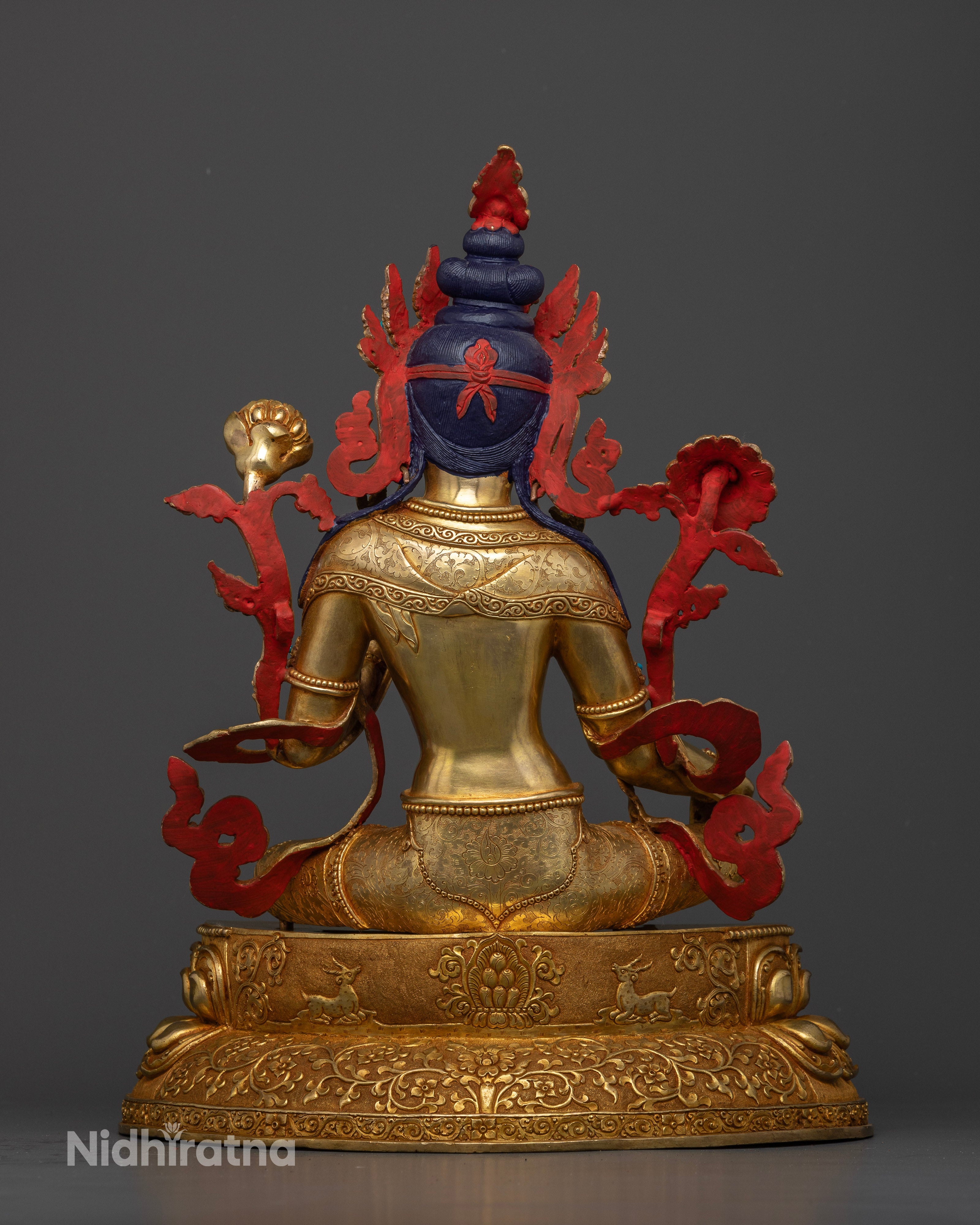Back view of Green Tara sculpture engraved robes coral turquoise inlays handcrafted Nepalese