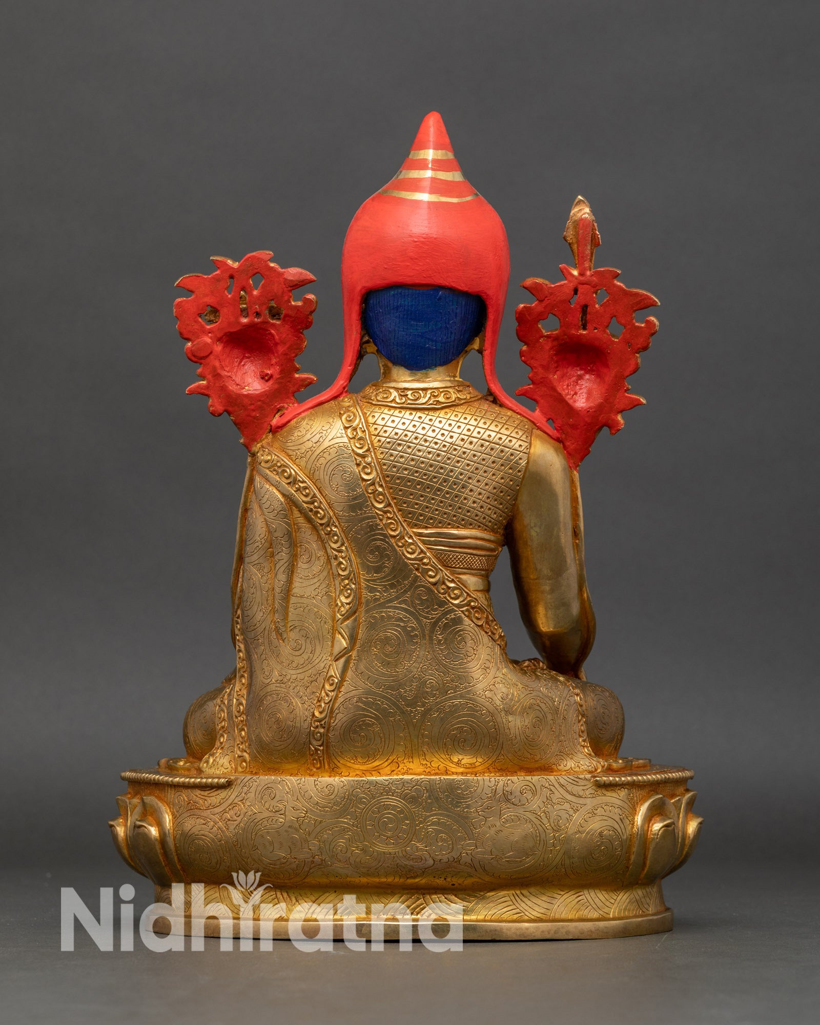 Back view of Longchenpa statue with lotus base and carved sacred motifs