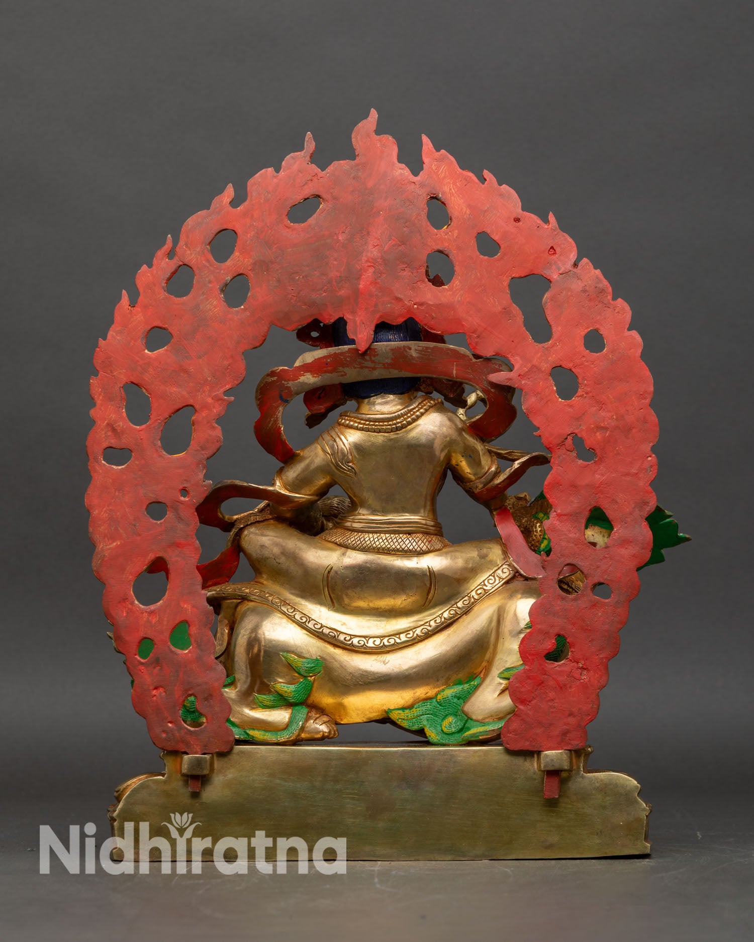 Back view of Namtoshe statue flaming halo intricate details Tibetan Nepalese sacred art