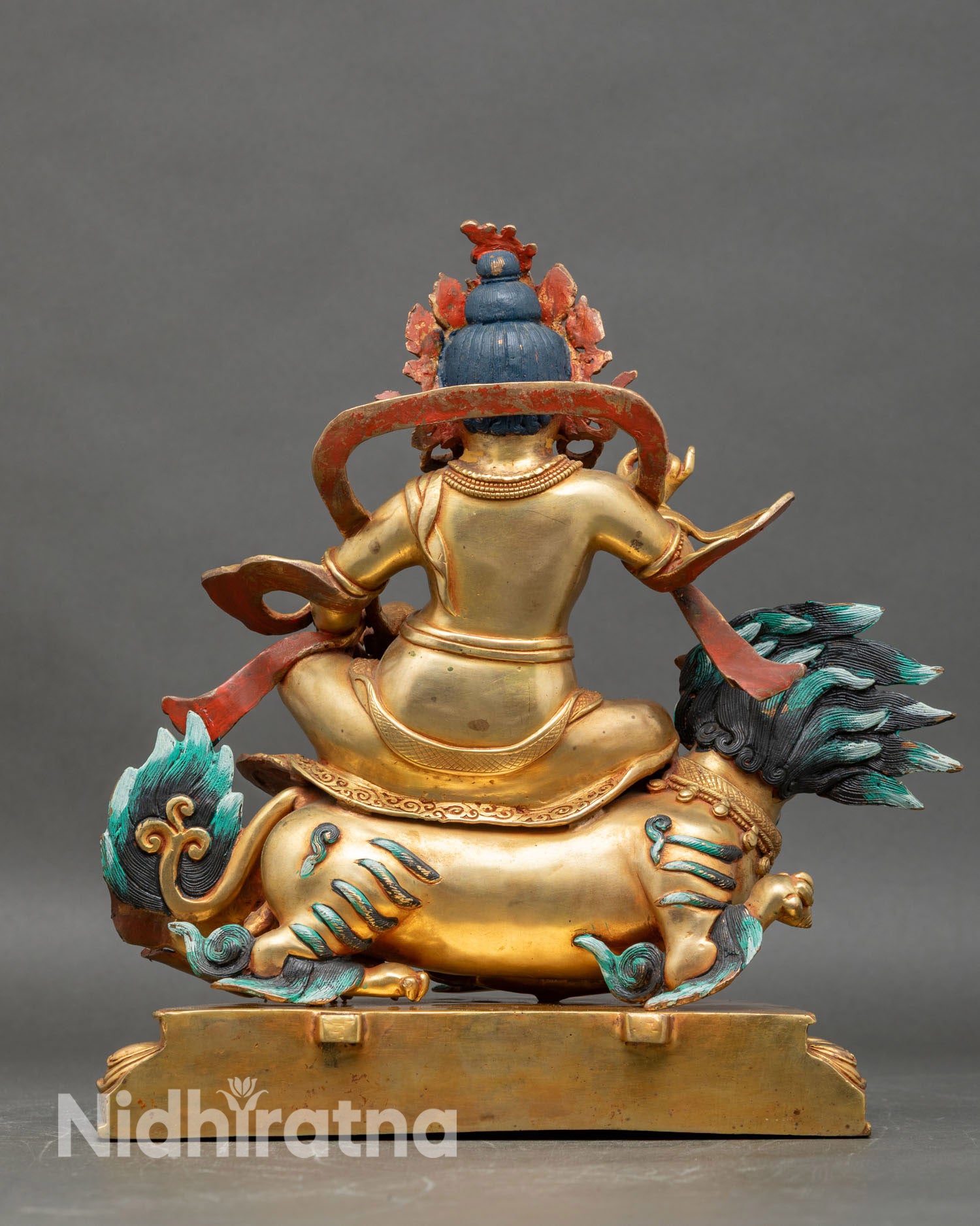 Back view Namtoshe statue flowing robes, Himalayan art