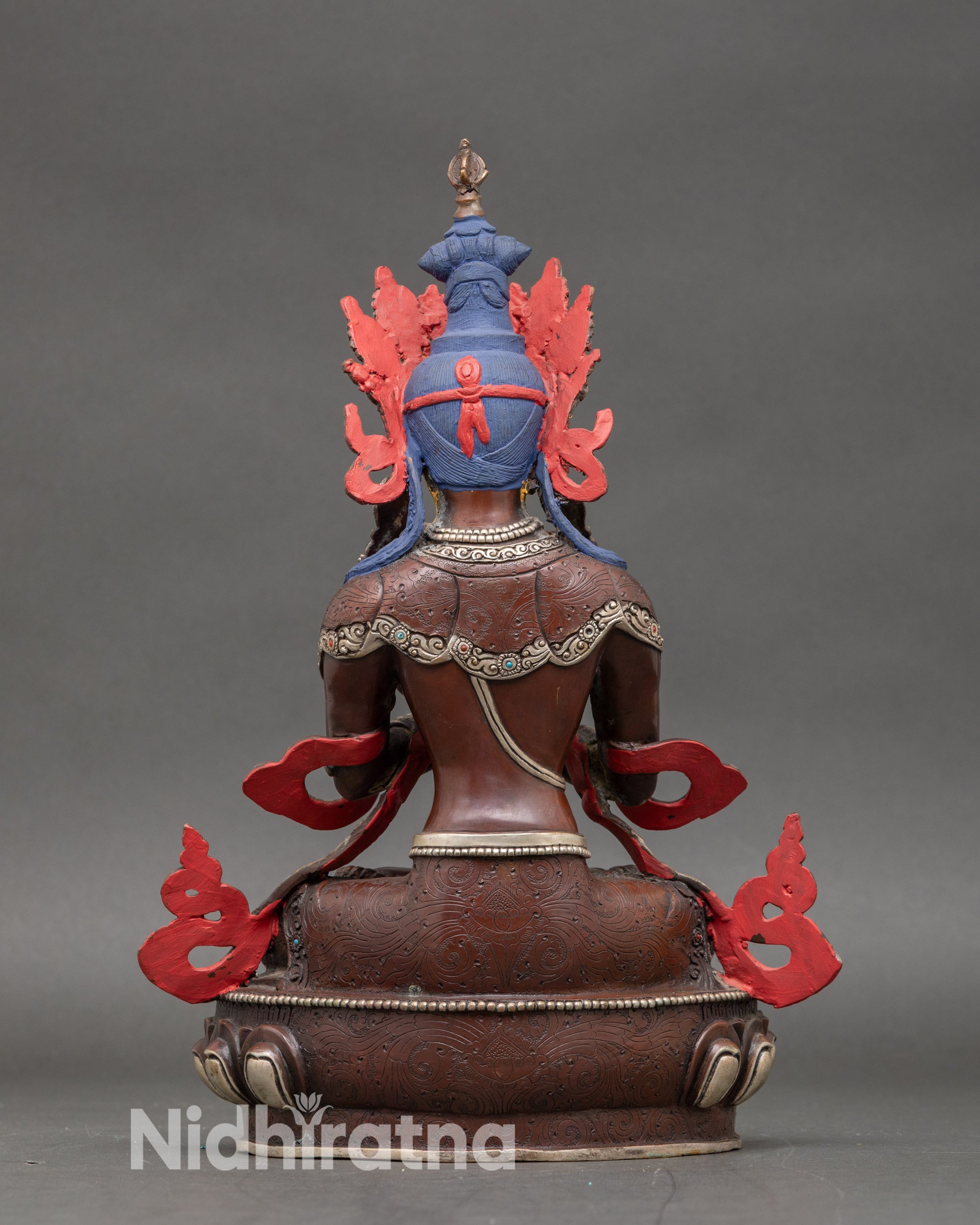 Back view of Vajradhara Buddha figurine, intricate Himalayan copper and gold detailing