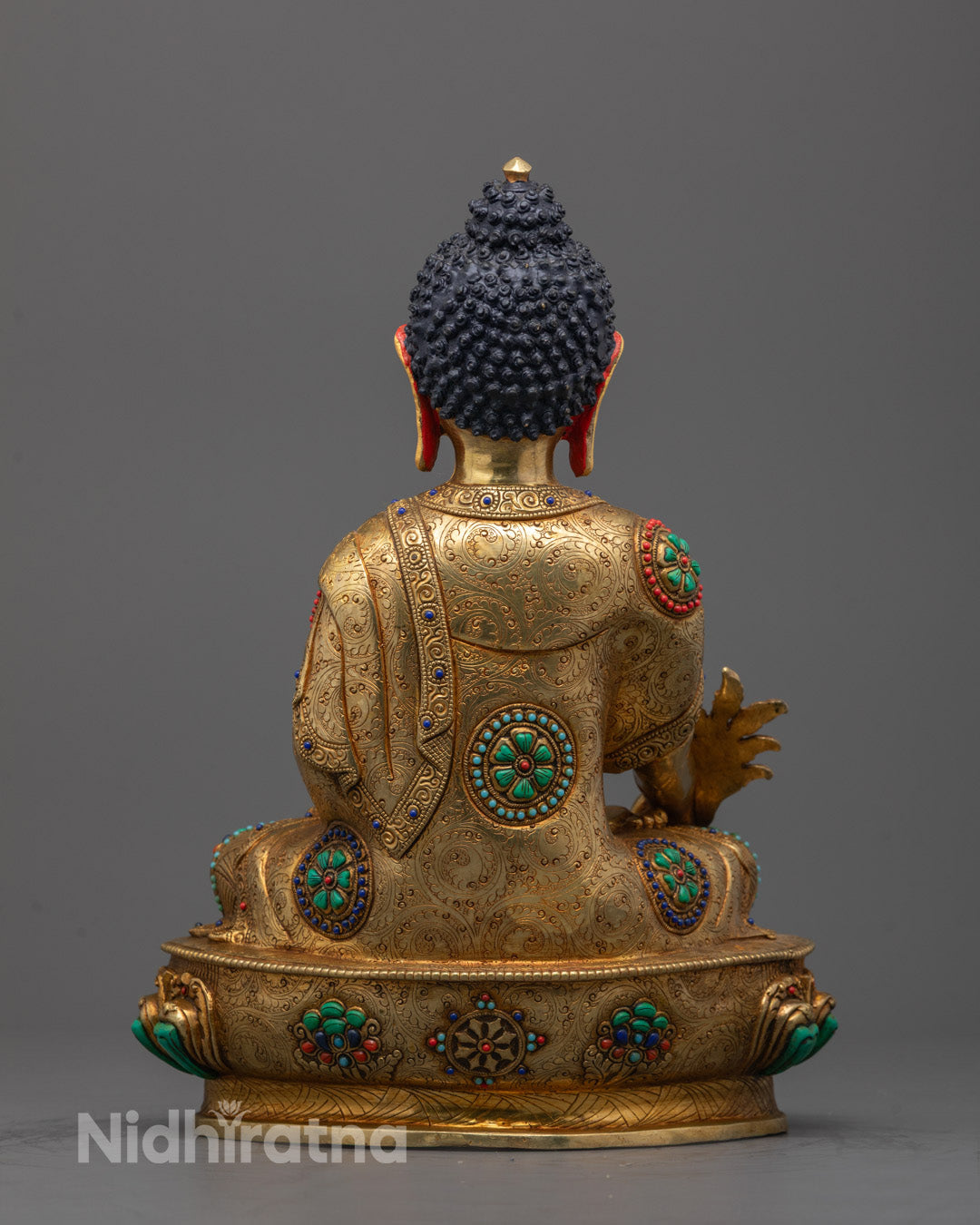 Back-view of Medicine Buddha statue with hollow consecration chamber for mantras