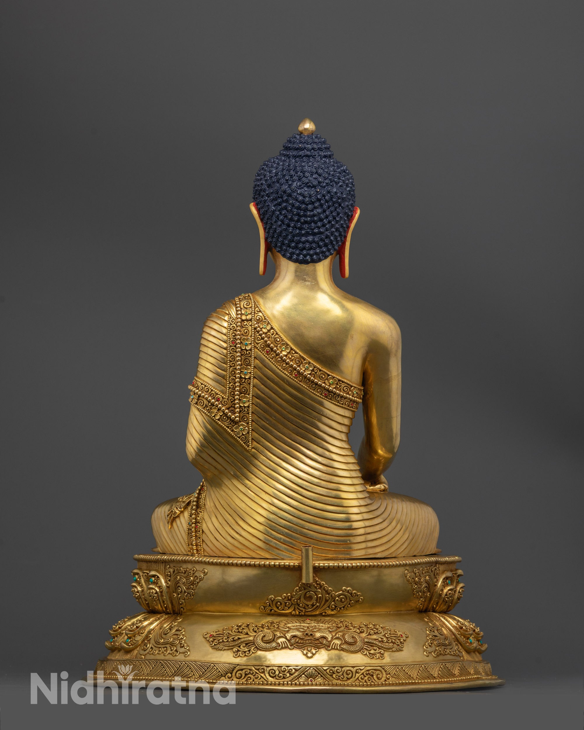 Back-view of Sacred Shakyamuni Buddha Figure in Meditation Pose