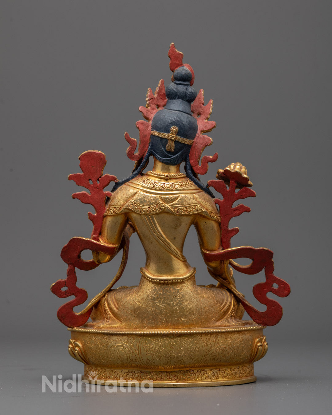 Back-view of White Tara statue with gold-plated finish and protective mudras, representing healing