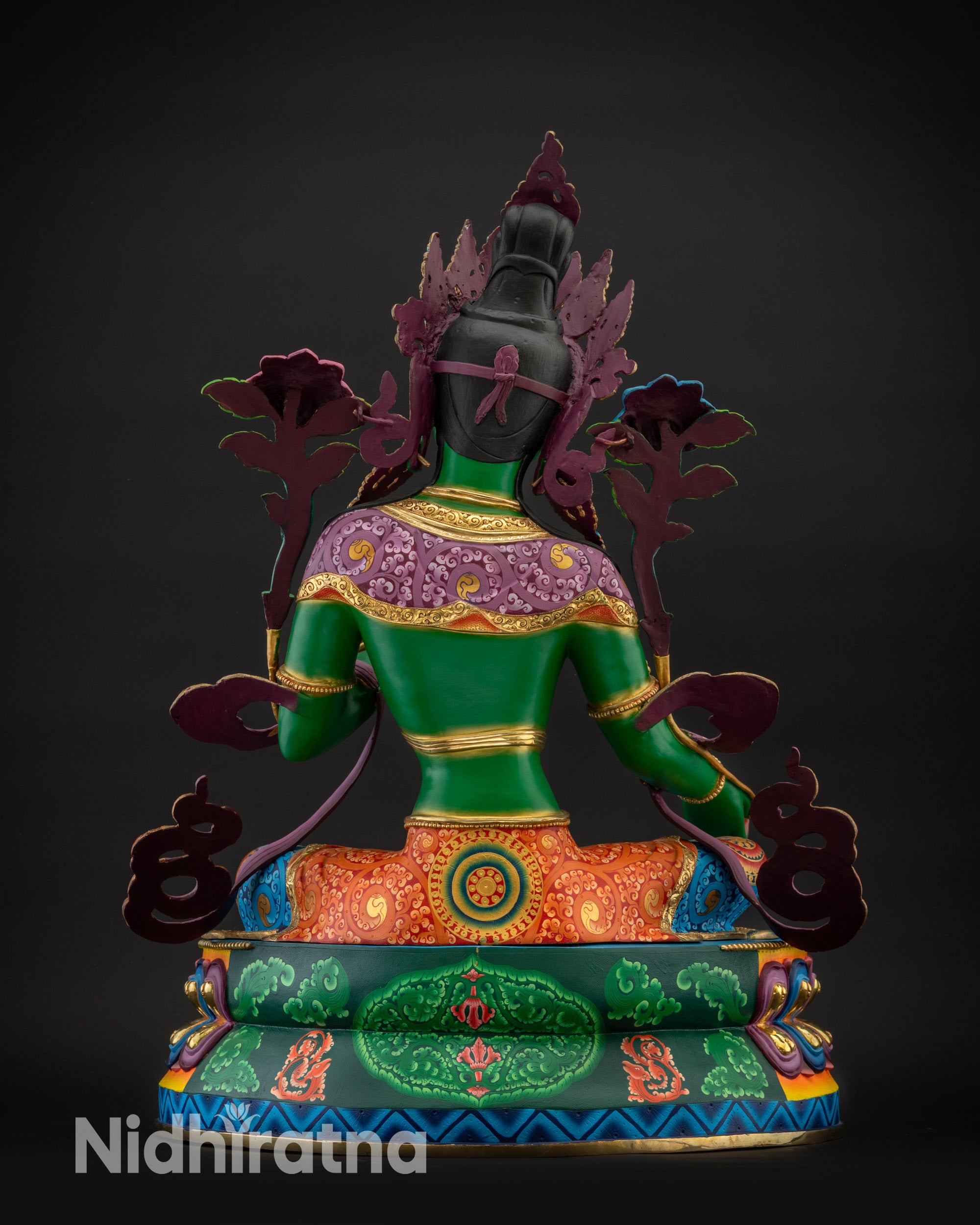 Back Green Tara statue view showing flowing robes and lotus base details