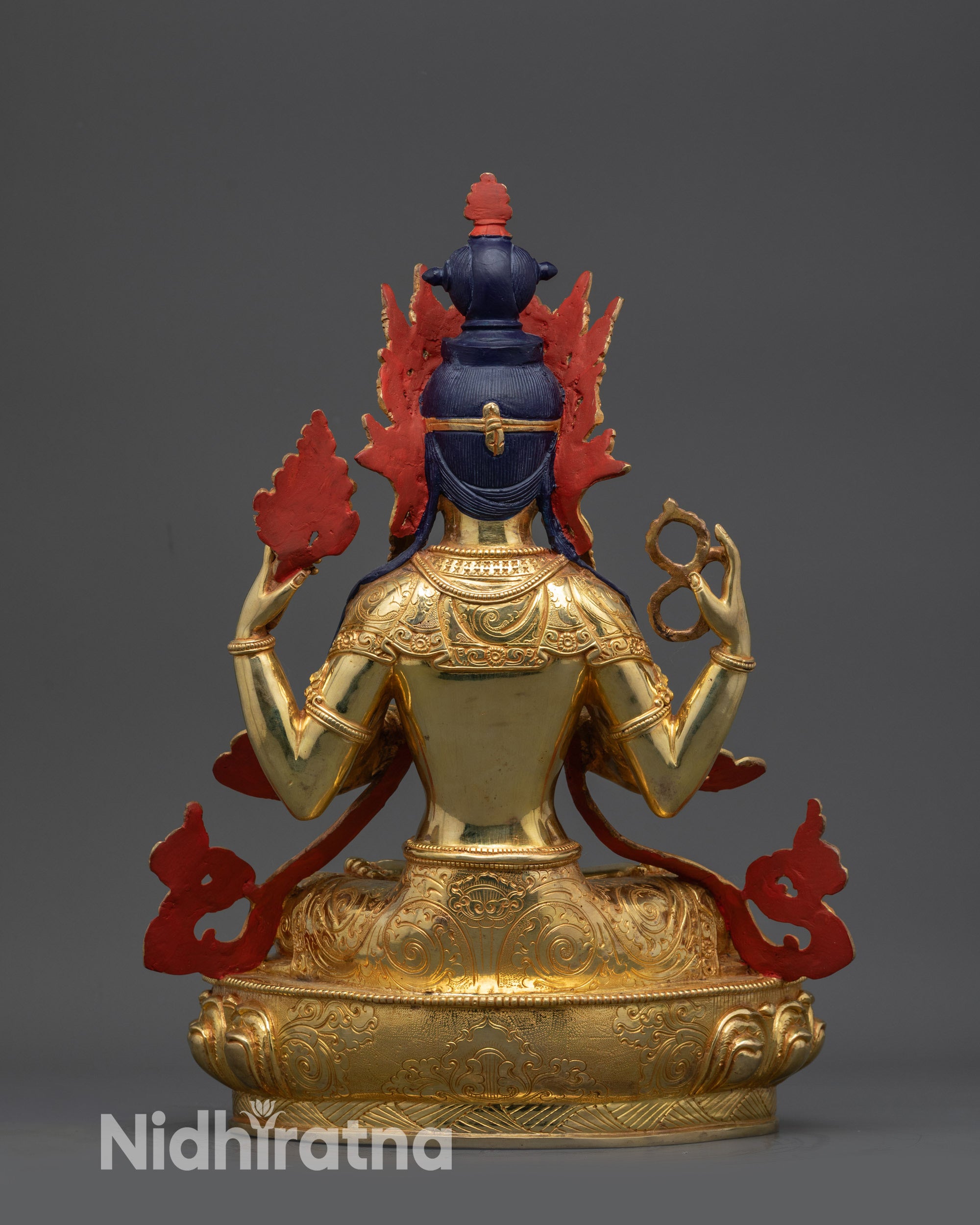 Back View of Avalokiteshvara Statue Highlighting Carved Robe Patterns and Base