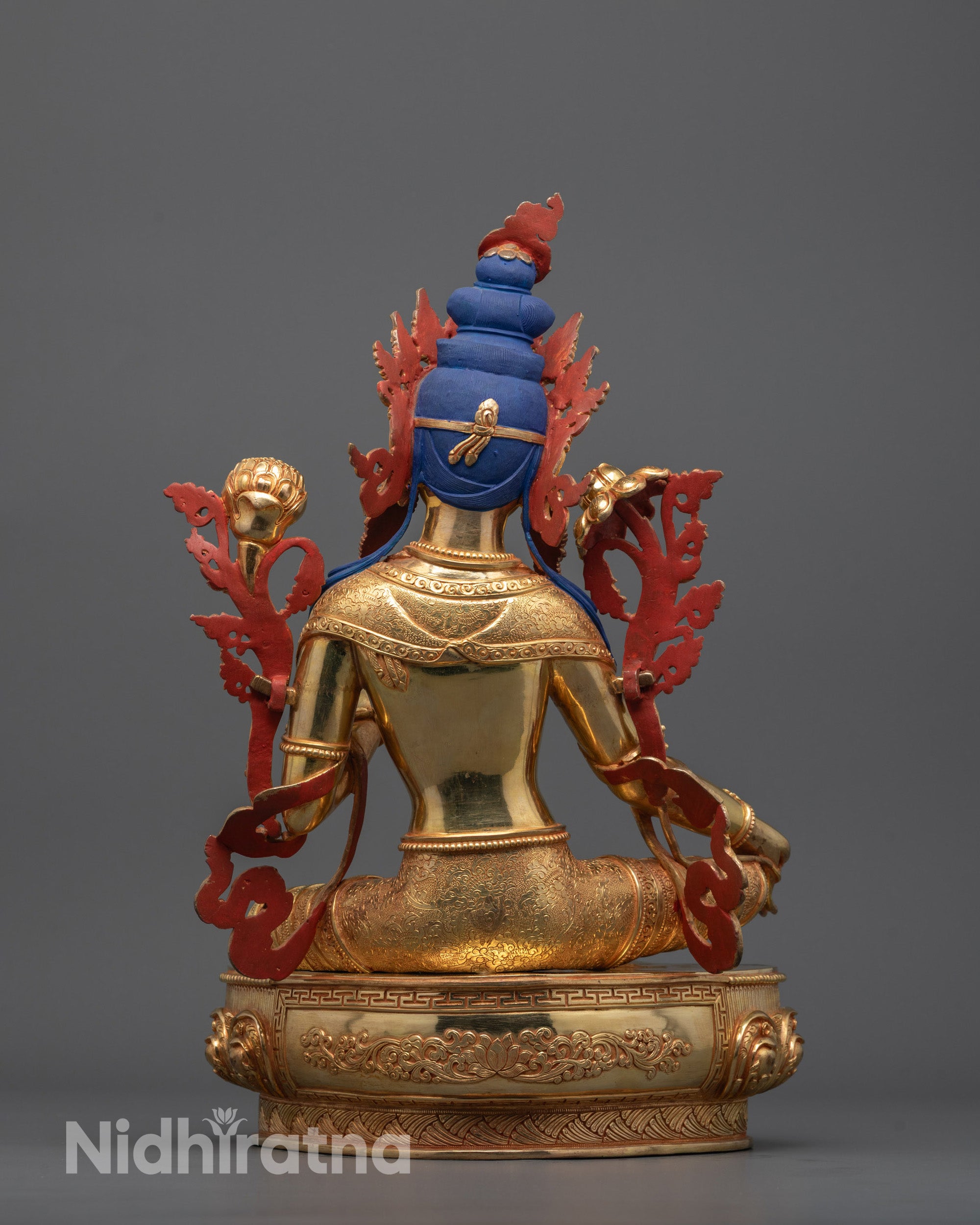 Back View of Nepalese Green Tara Statue Showcasing Detailed Robes and Lotus Base