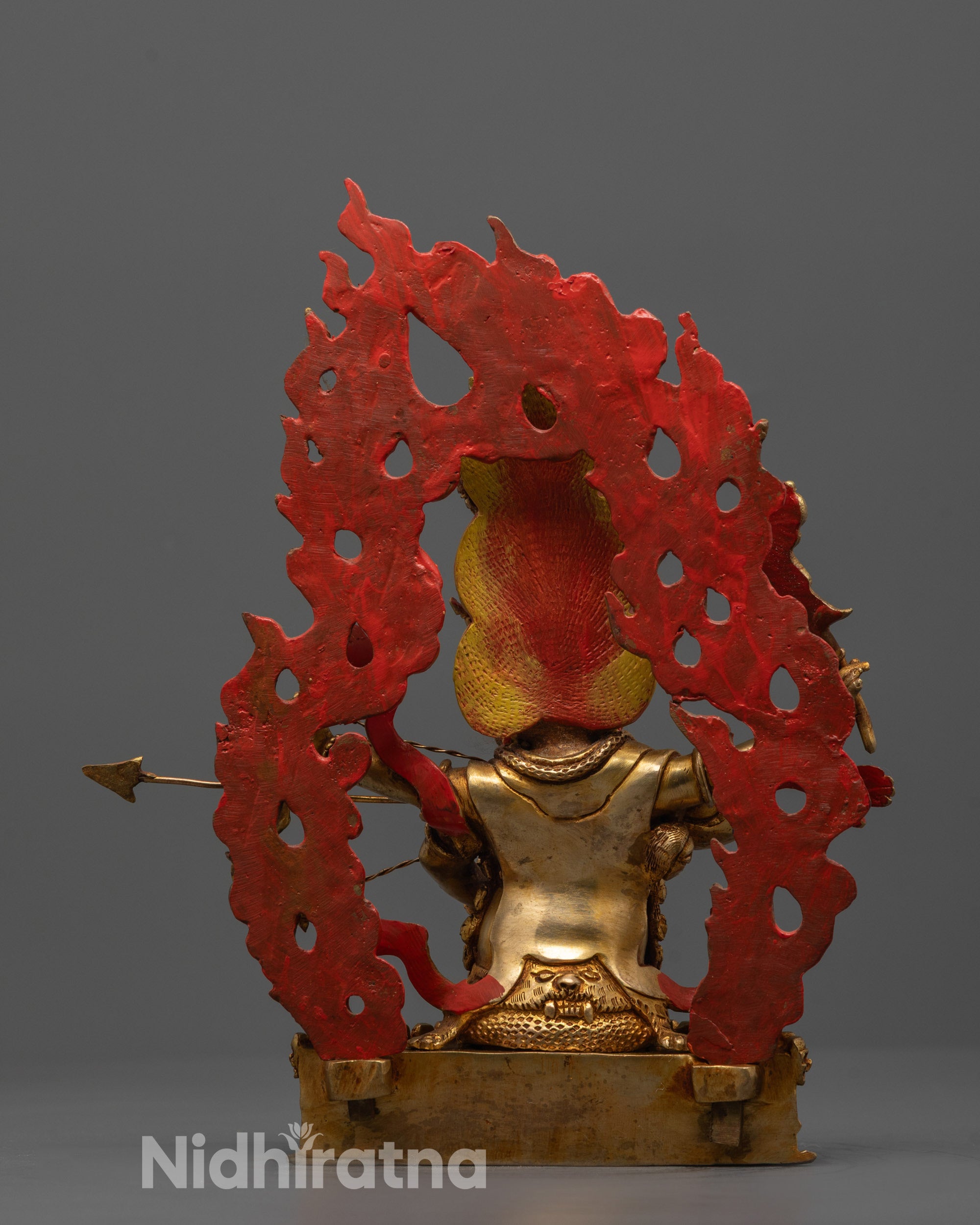 Back View of Rahula Statue Surrounded by Flaming Aura