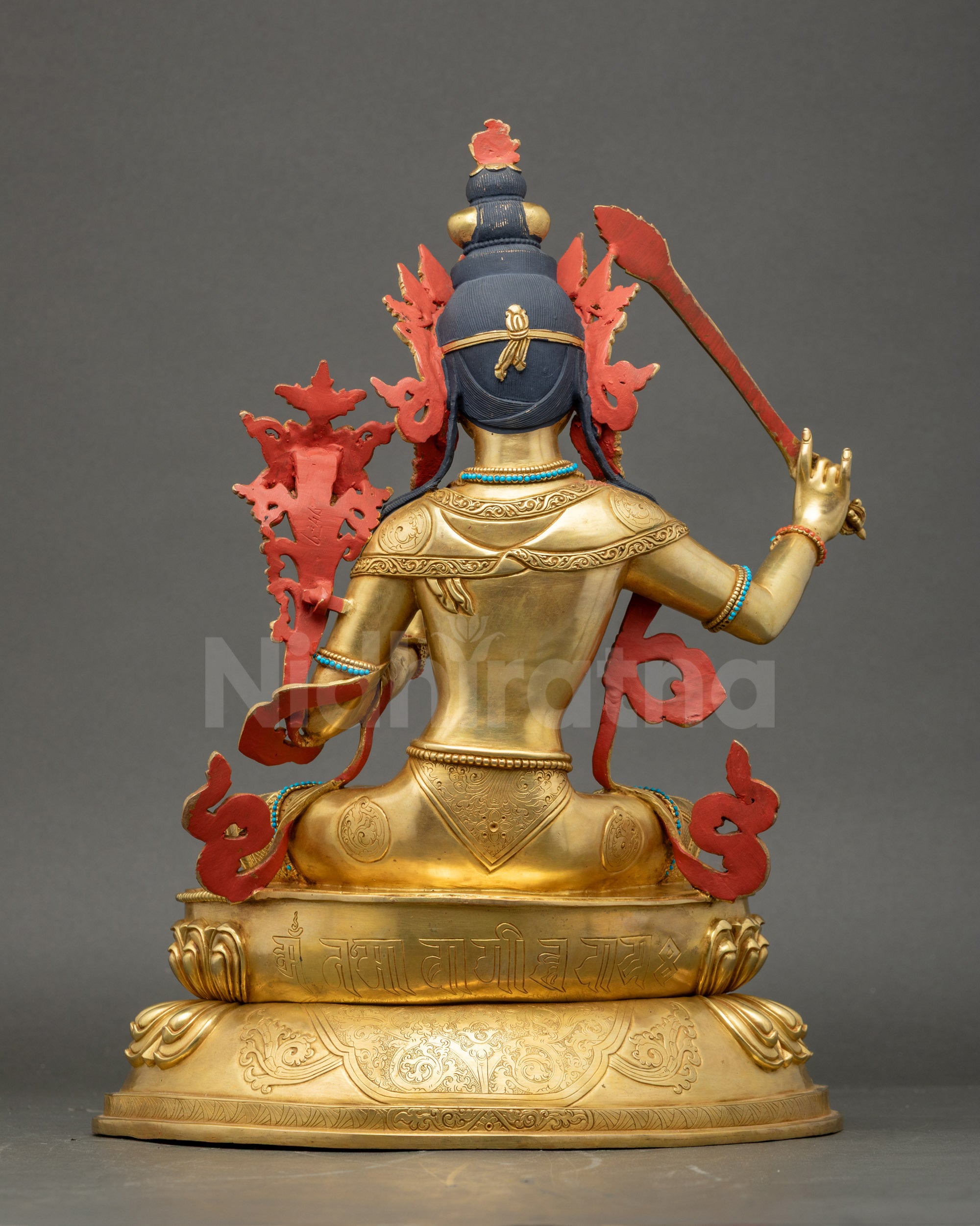 Back of Manjushri Sculpture Showing 3D Carving and Gold Finish
