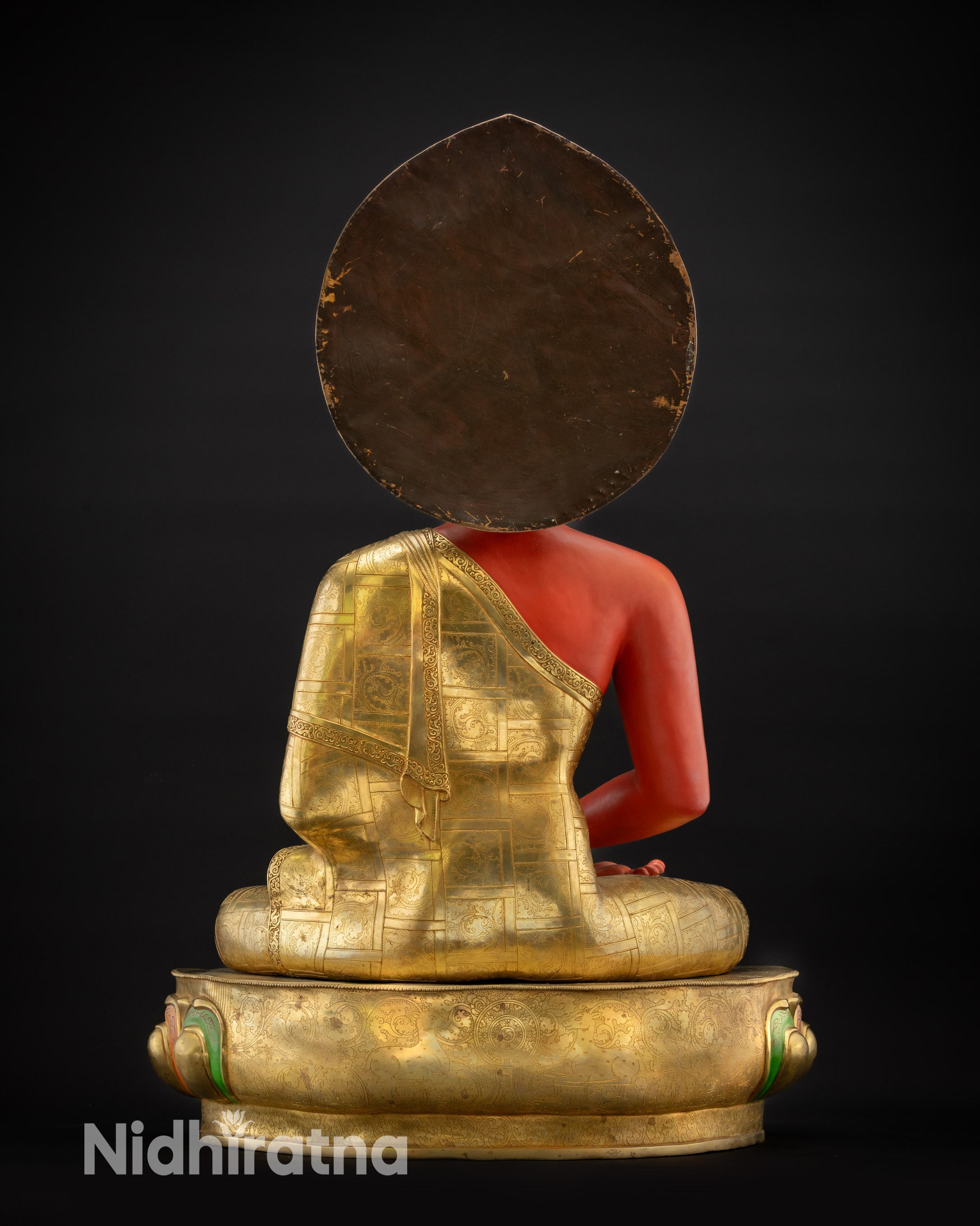 Back view Amitabha Buddha Statue showing dharma wheel and pair of deer on lotus