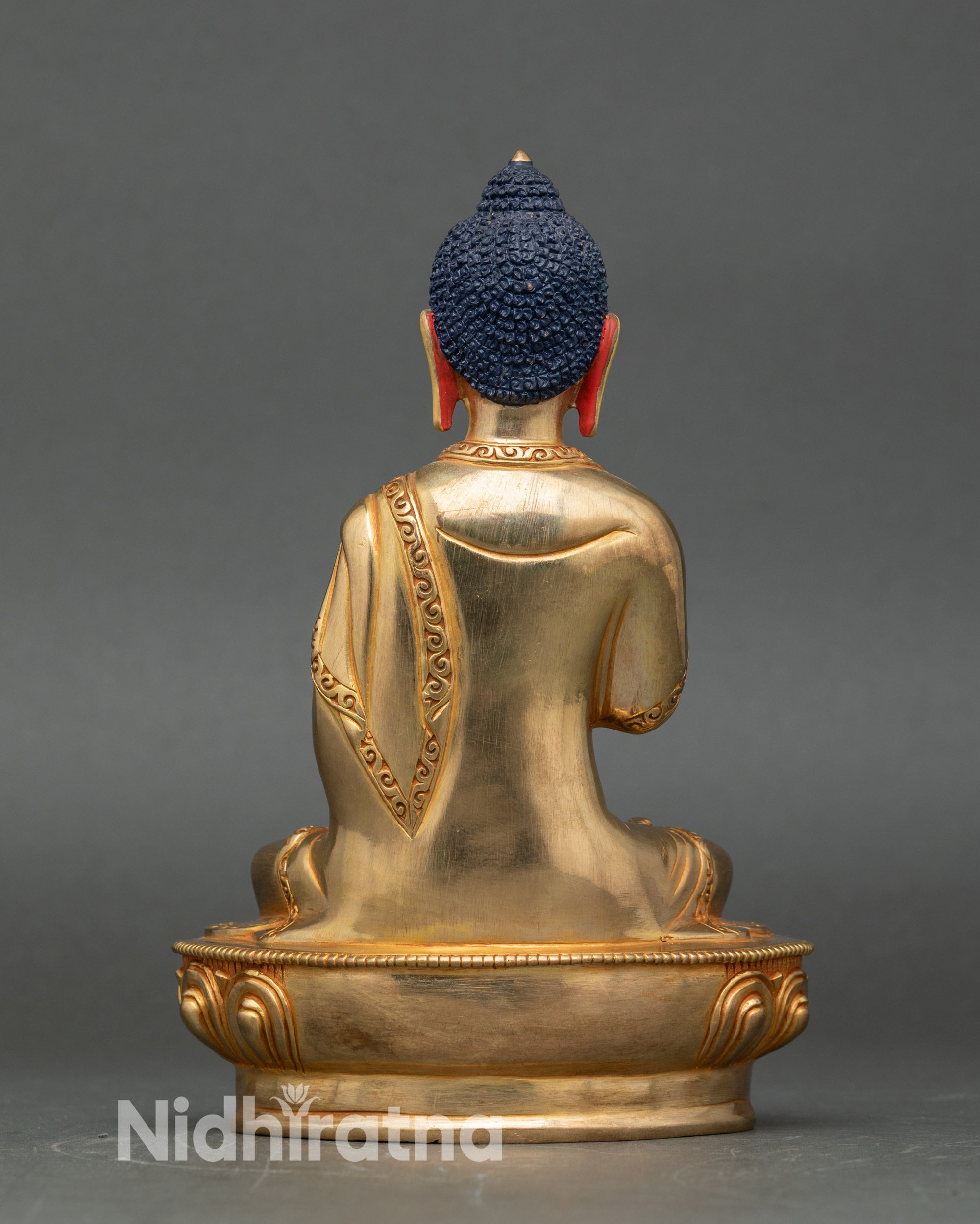 Back view Amoghasiddhi Buddha, copper body with gold finish, sacred meditation and protection art