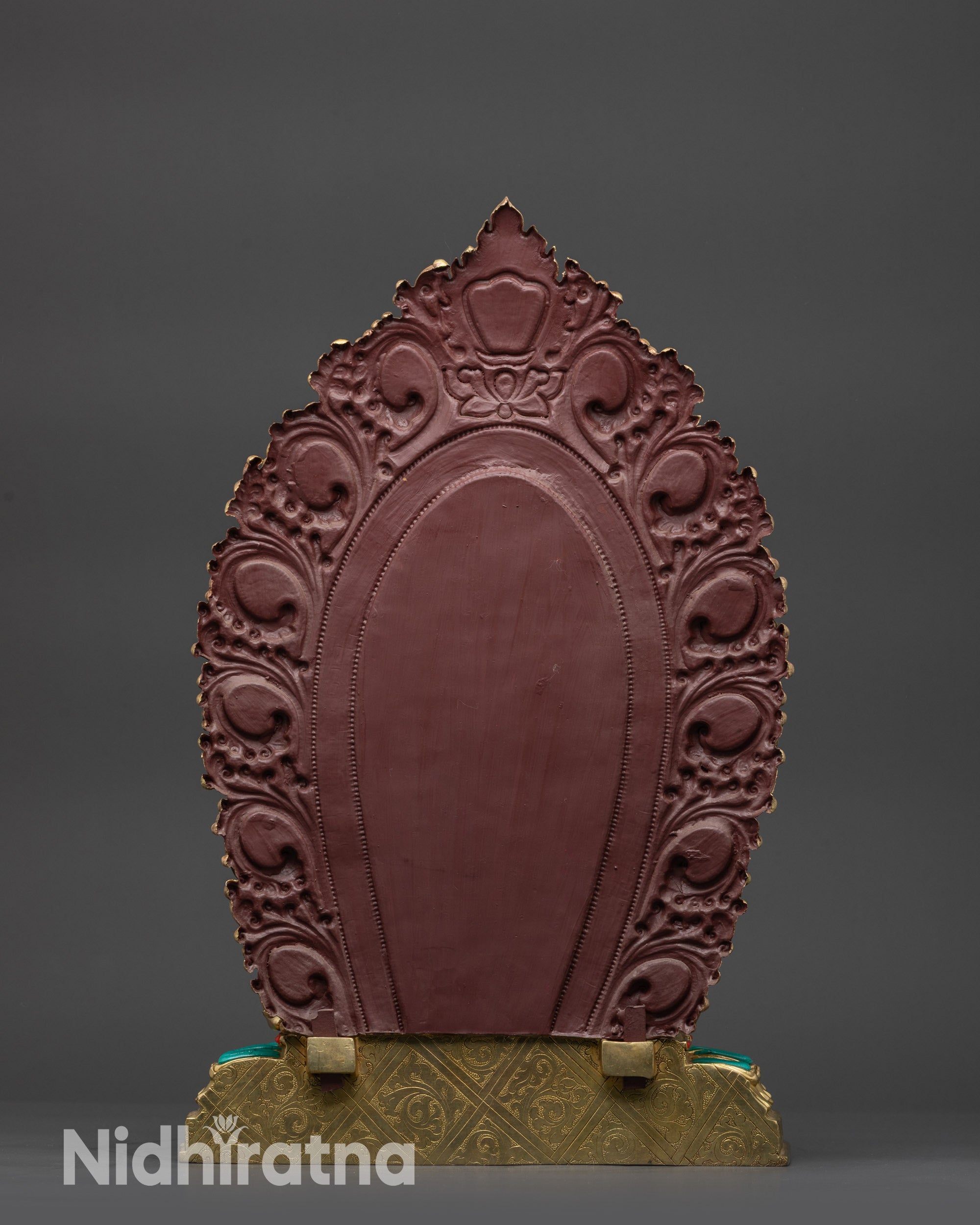 Back view Black Dzambhala Sculpture with carved wrathflame halo and gemstone adornments