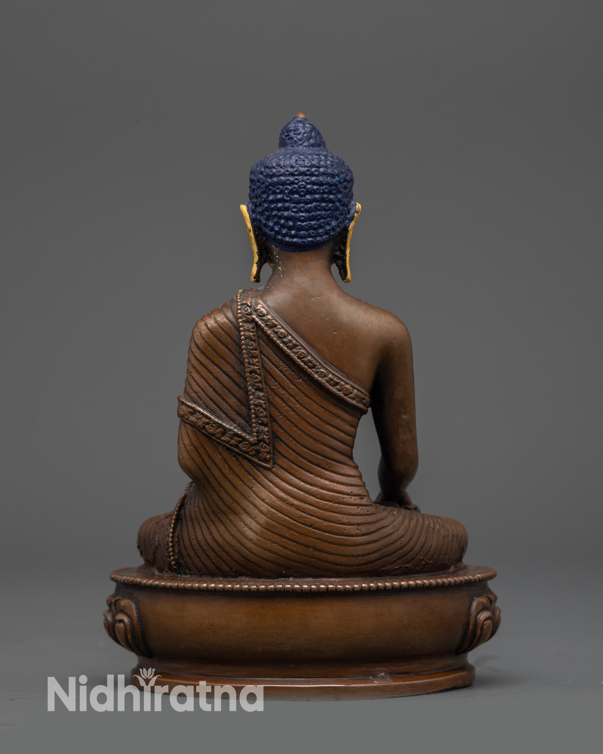 oxidized copper Tibetan Buddha with detailed robes