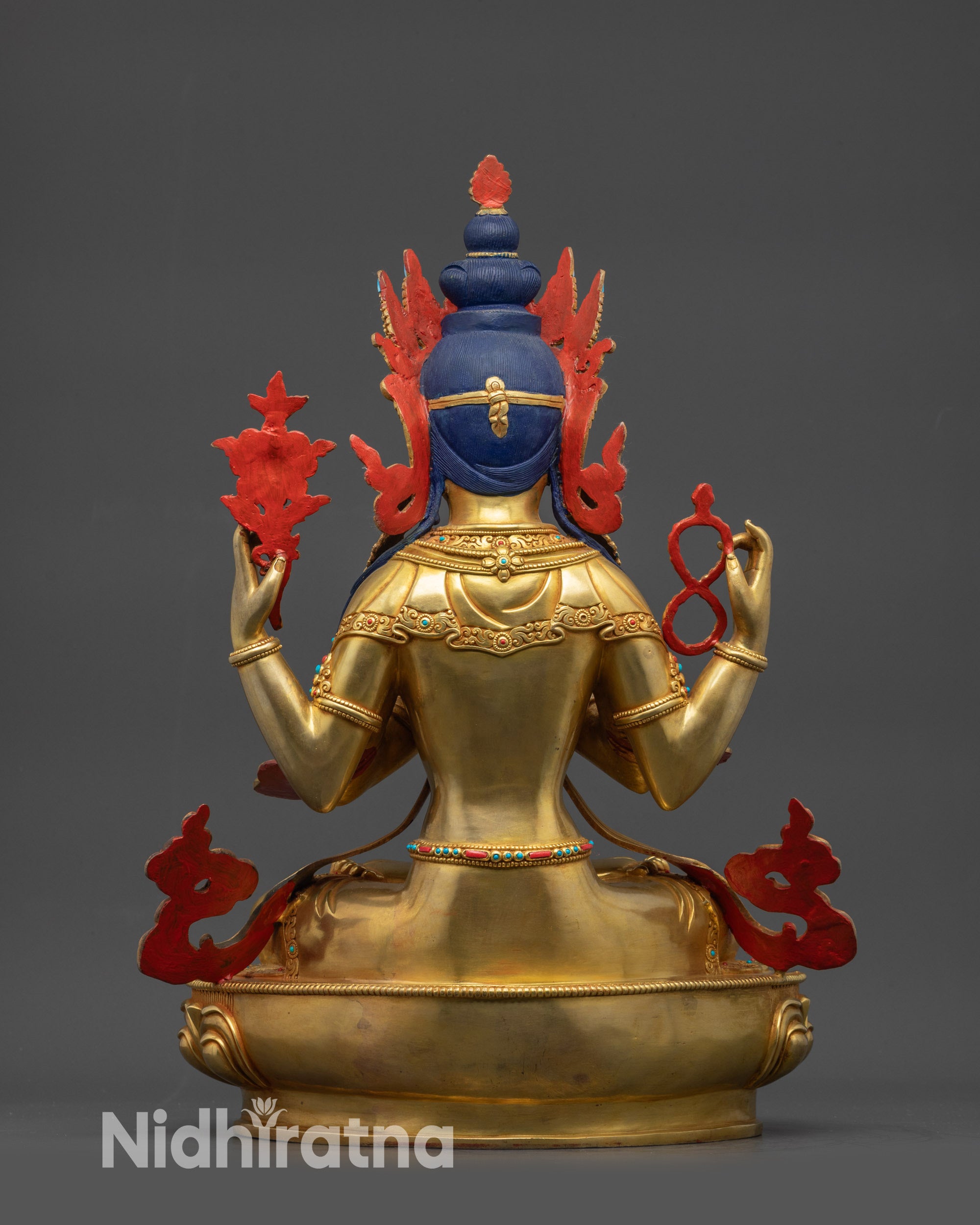 Back view Chenrezig Buddha sculpture showing lotus throne and carvings