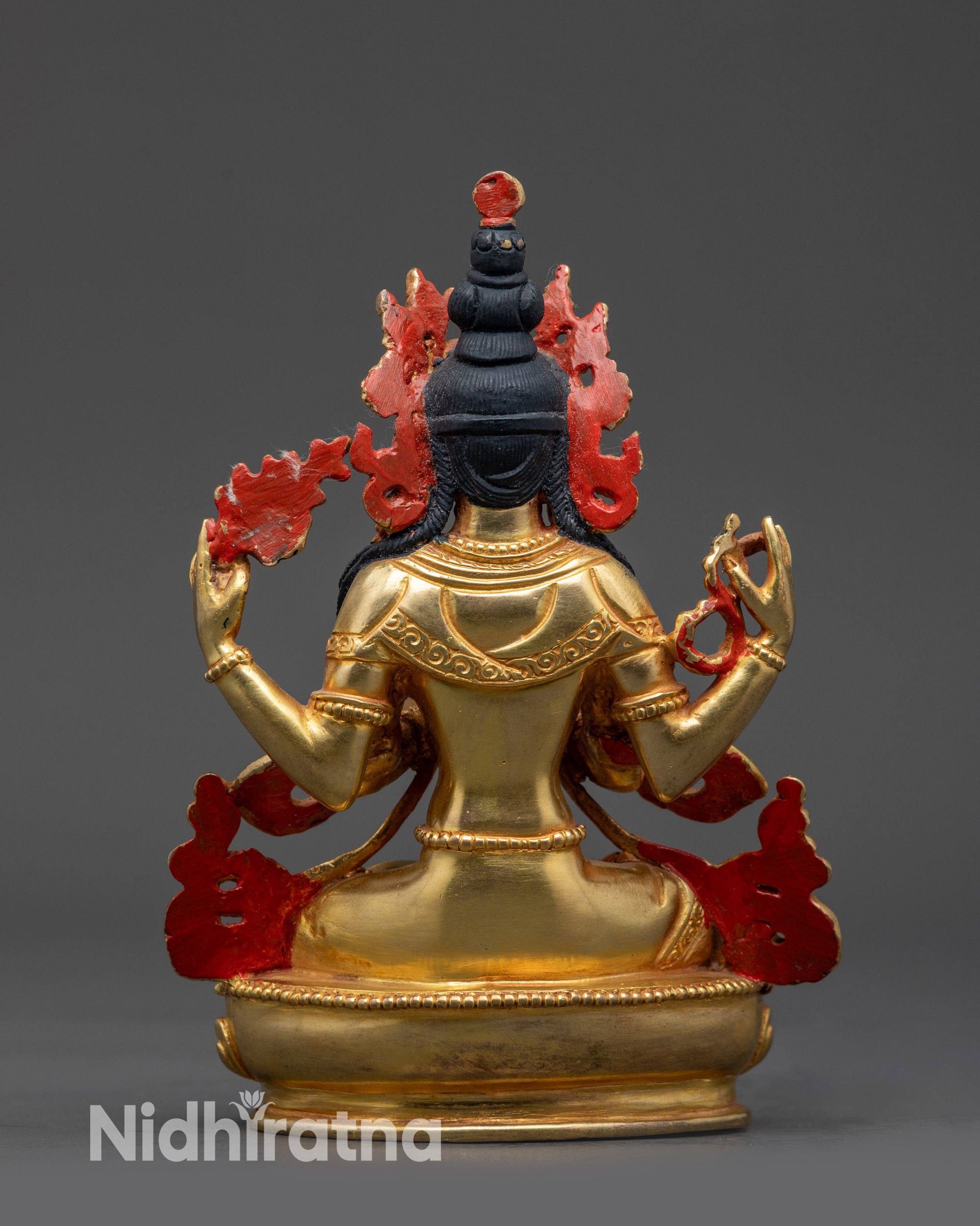 Back view Chenrezig Statue displaying flowing robes, intricate craftsmanship, and gold finish